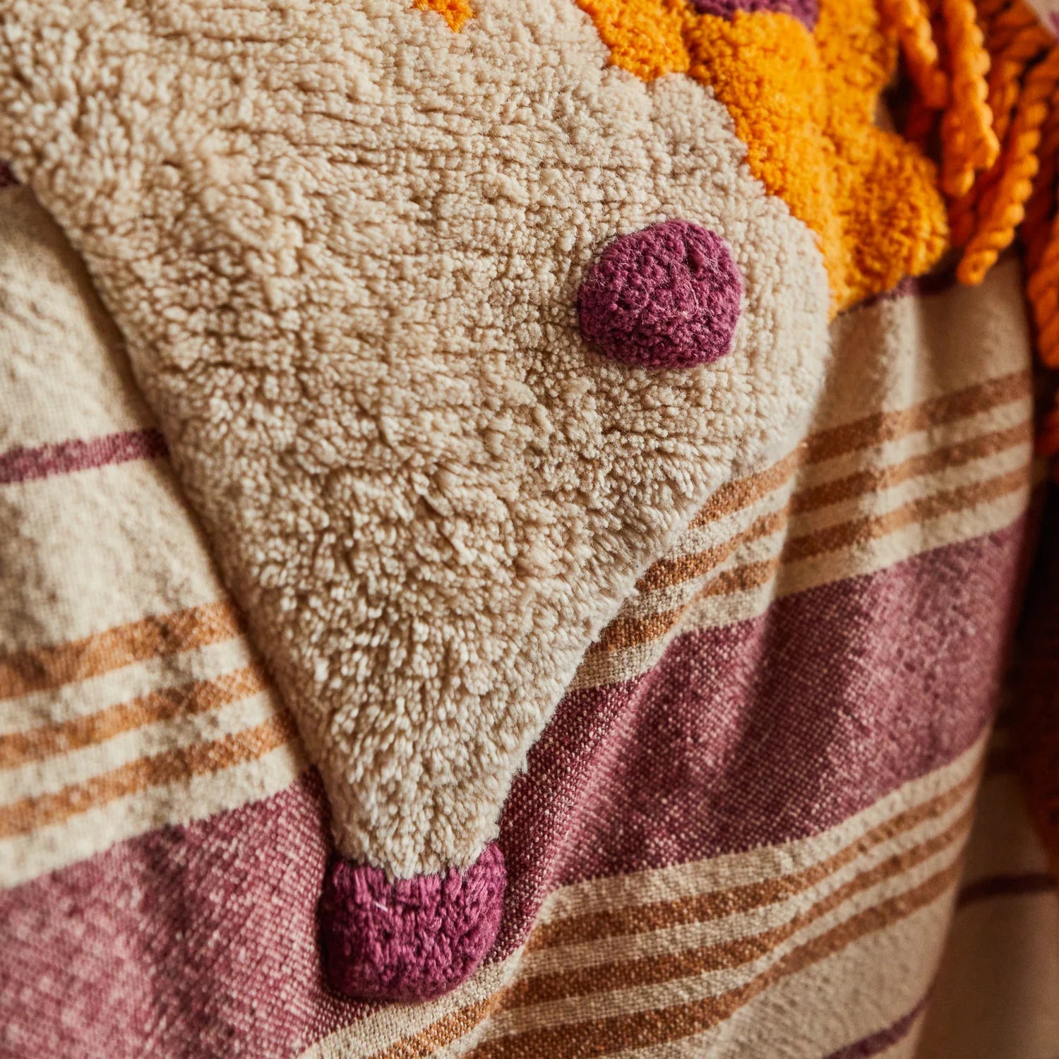 Close up detail of handguided tufting texture on Jarvis bedcover surface