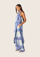 side view of model wearing Jordi Halter Wrap Top by MOS The Label