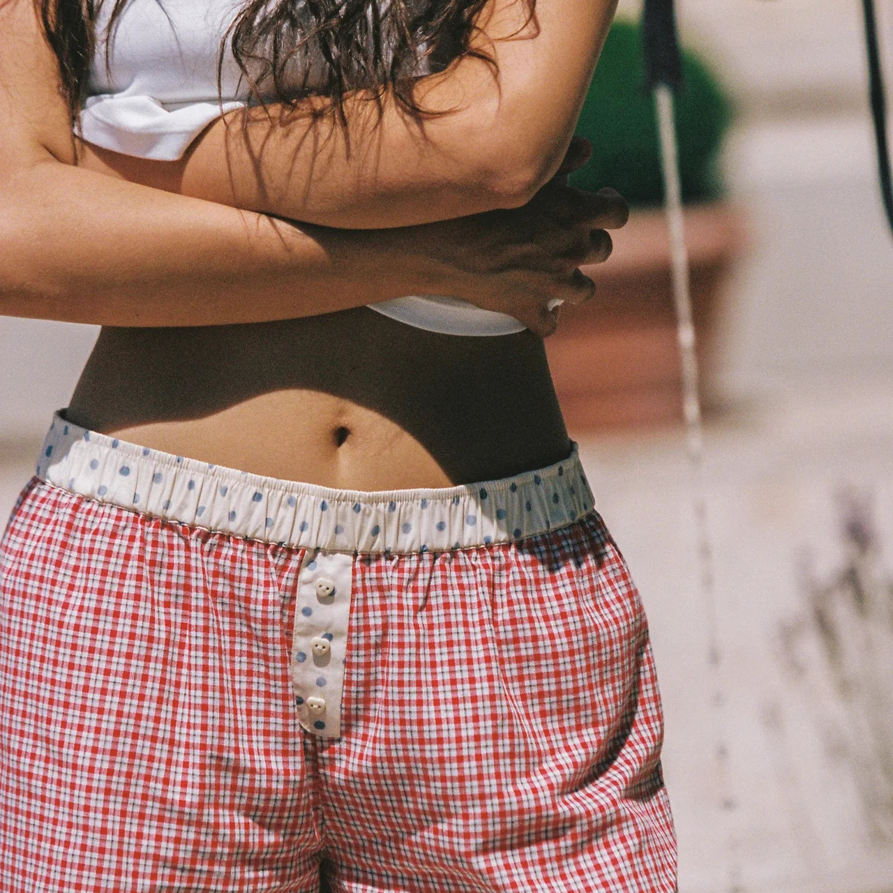 red check womens shorts with lace detailling and polka dot waist line