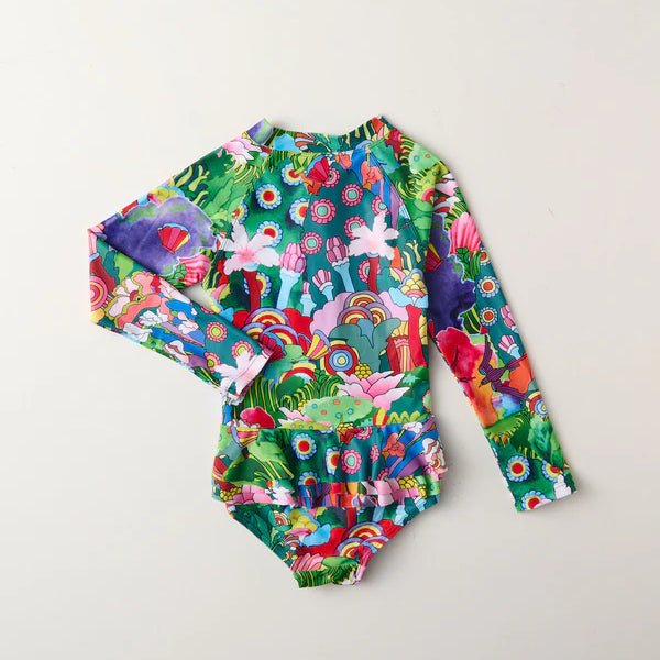 back view of Kip & Co x The Beatles Big Flower Dreamscape Long Sleeve Bathers