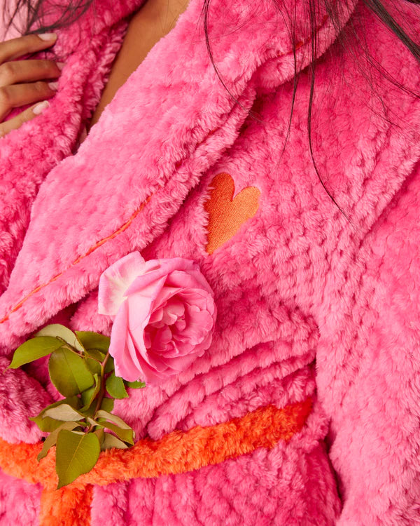 Close up detail of Kip & Co Cosy robe with heart embroidery