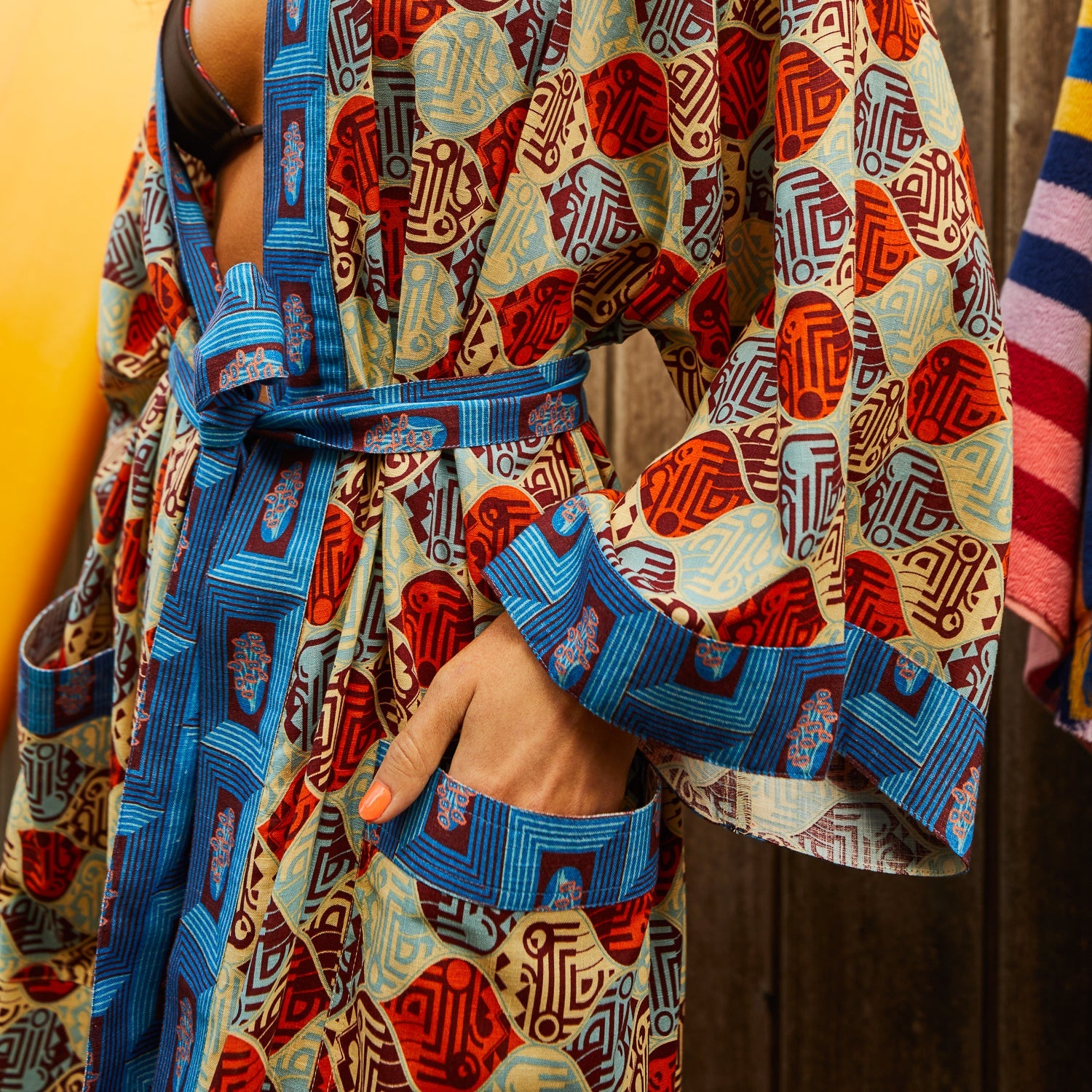 Close-up of Koa Robe silky lyocell fabric texture showing beautiful drape and flow