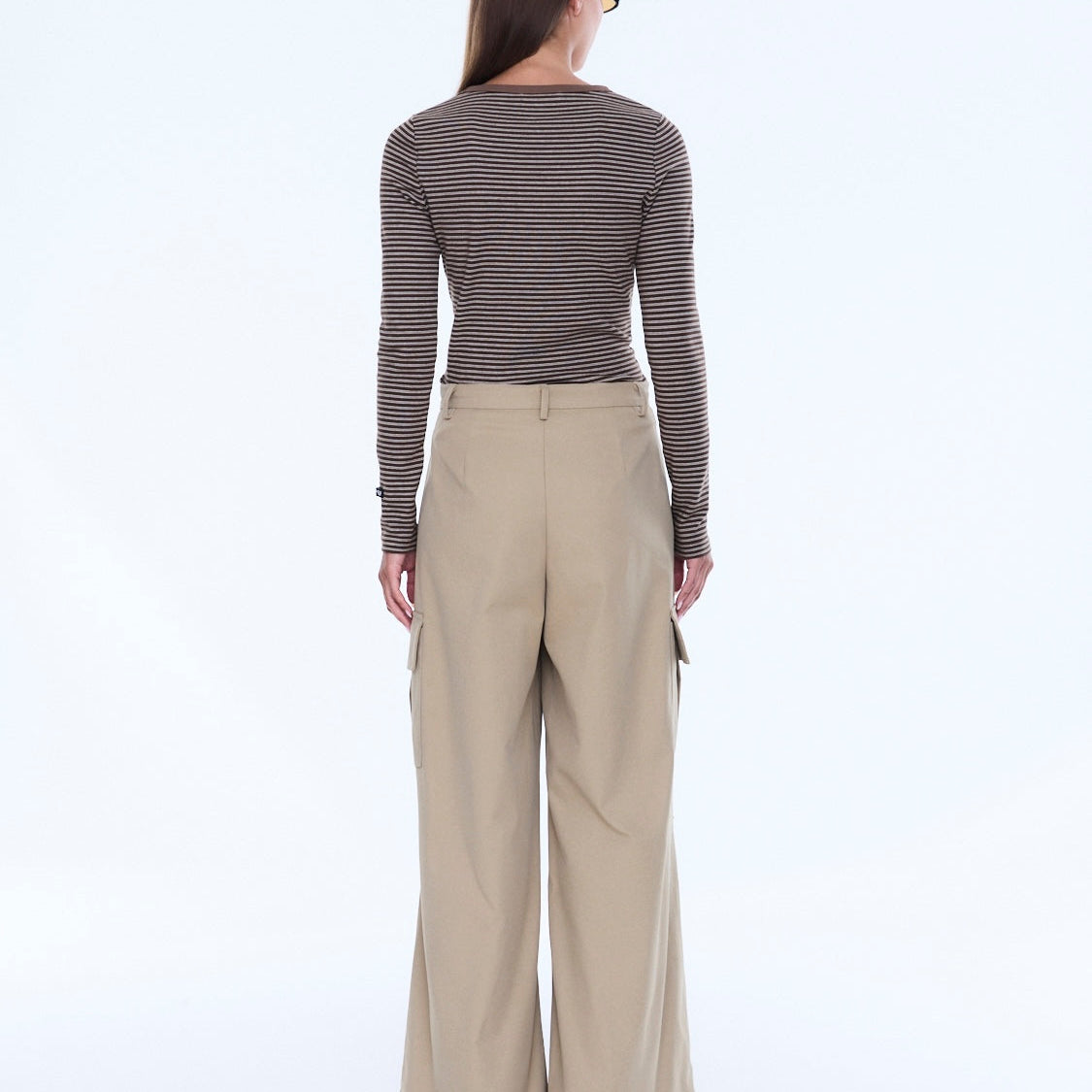 Back view of Lainey Cargo Pant in sand showing wide leg silhouette and rear waistband detail