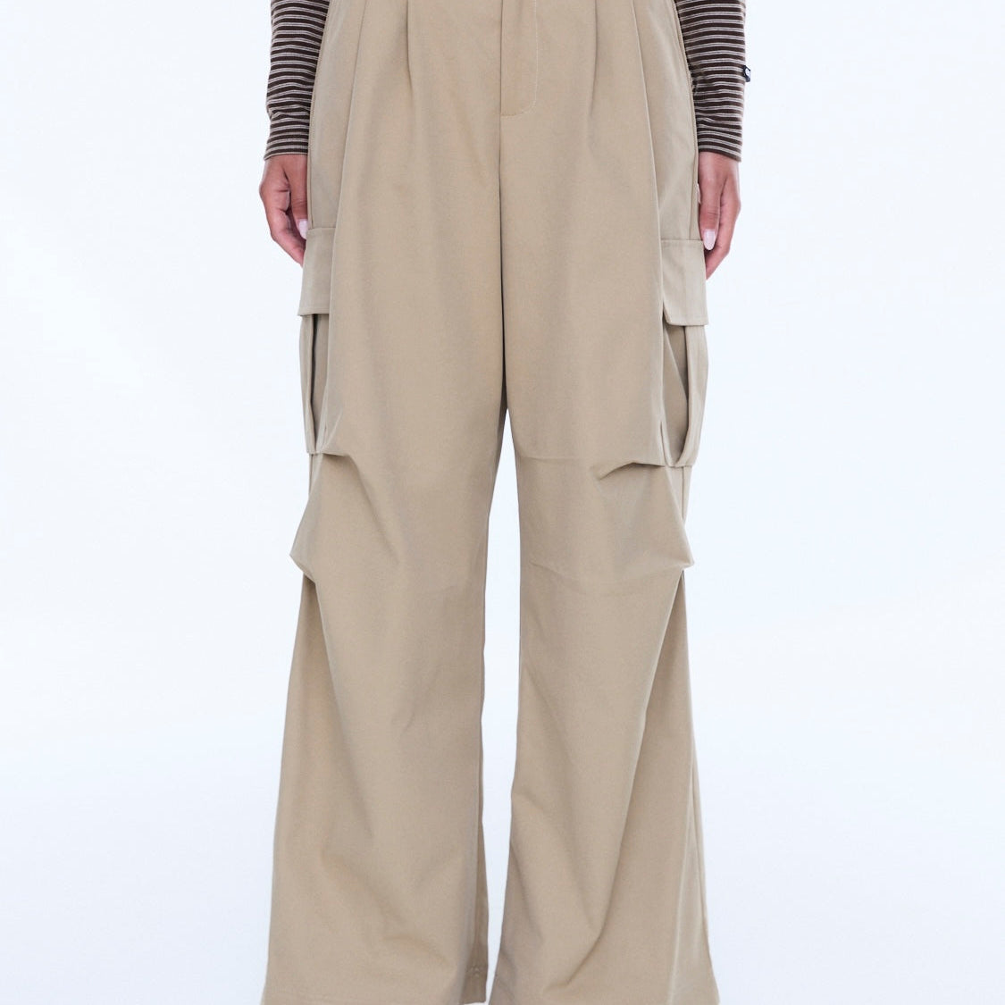 Rear close-up of Lainey Cargo Pant sand waistband and wide leg trouser construction details
