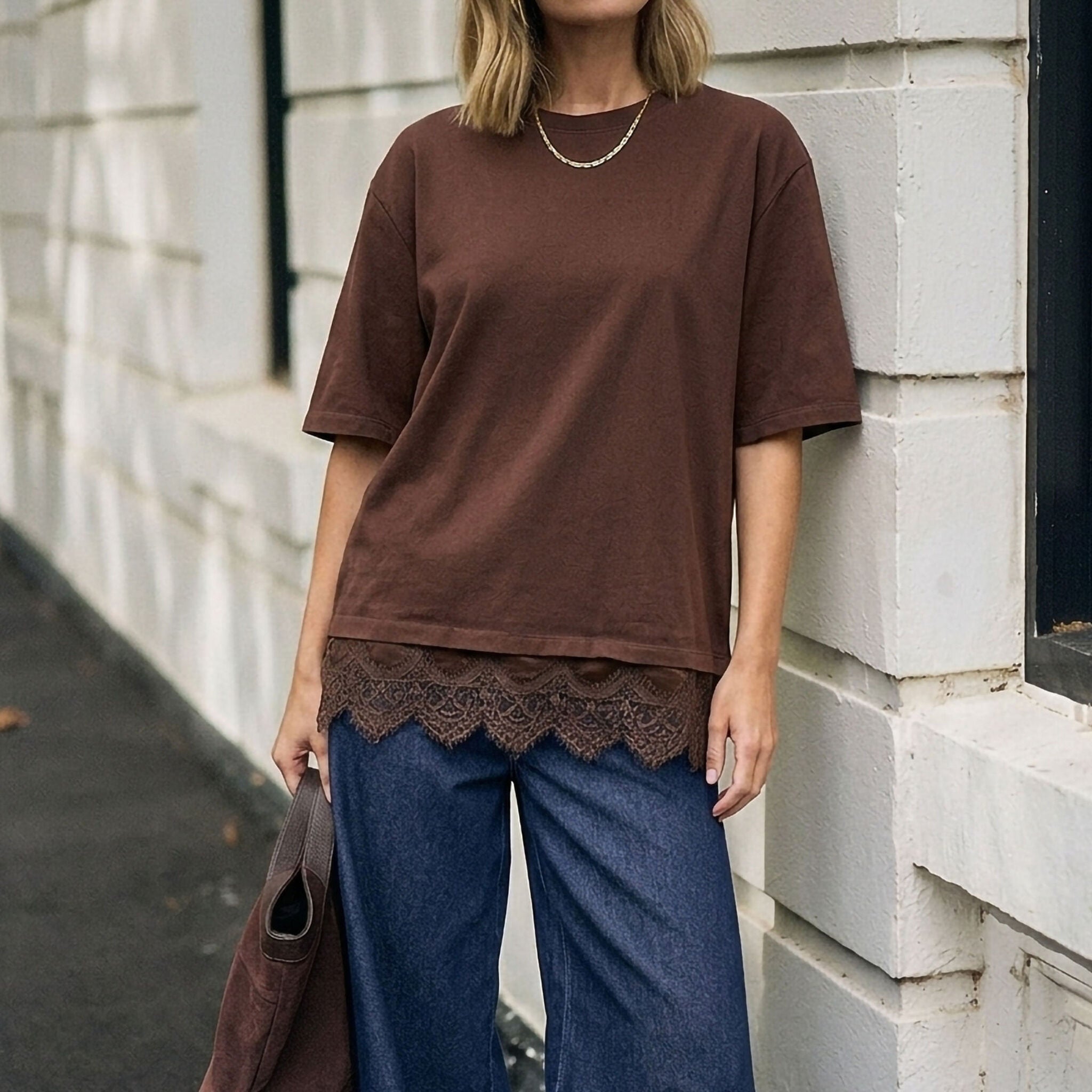 Full body shot of model in chocolate brown Lacey Tee showing relaxed fit and lace trim