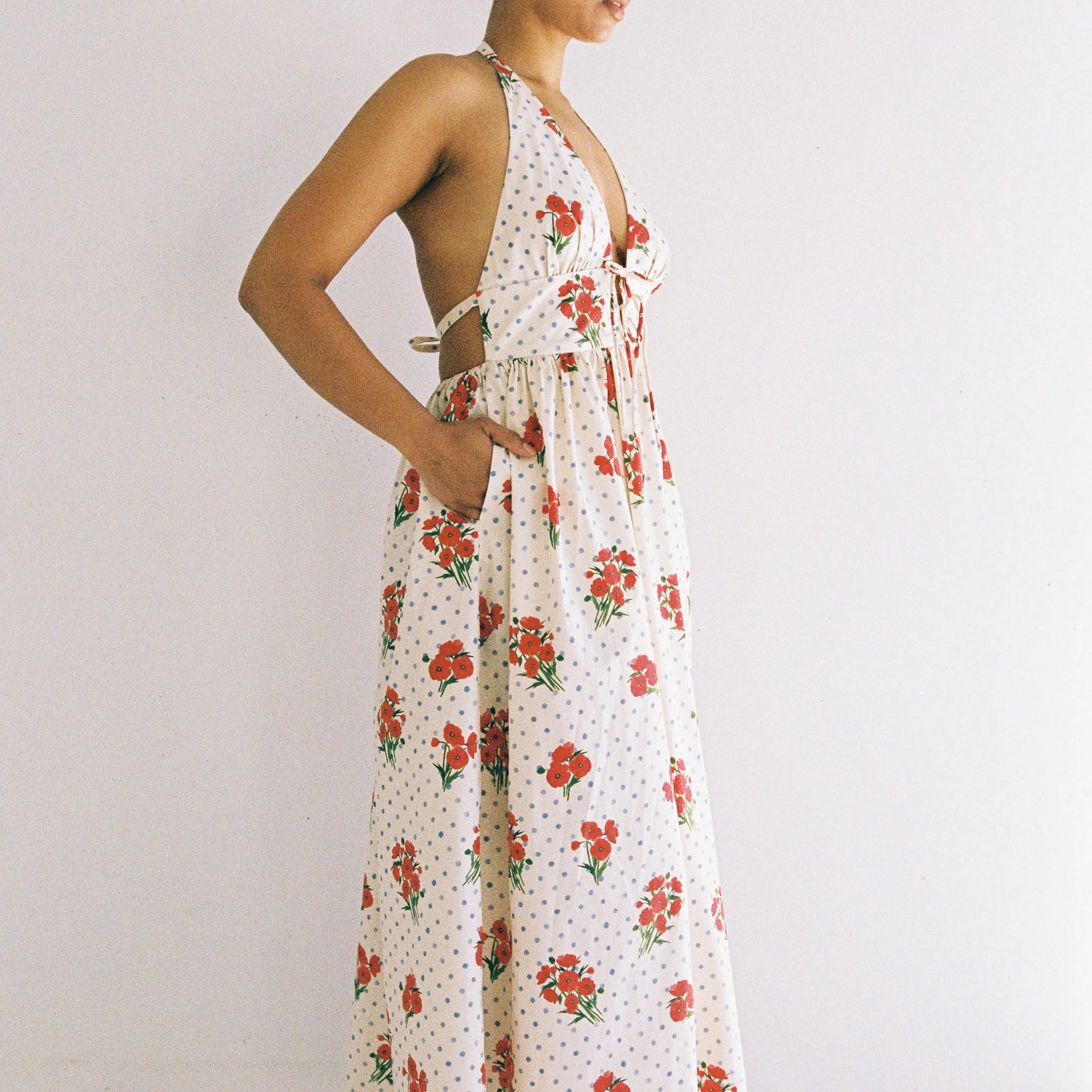 side profile of lady wearing Lily Maxi Dress Poppies by JUNI