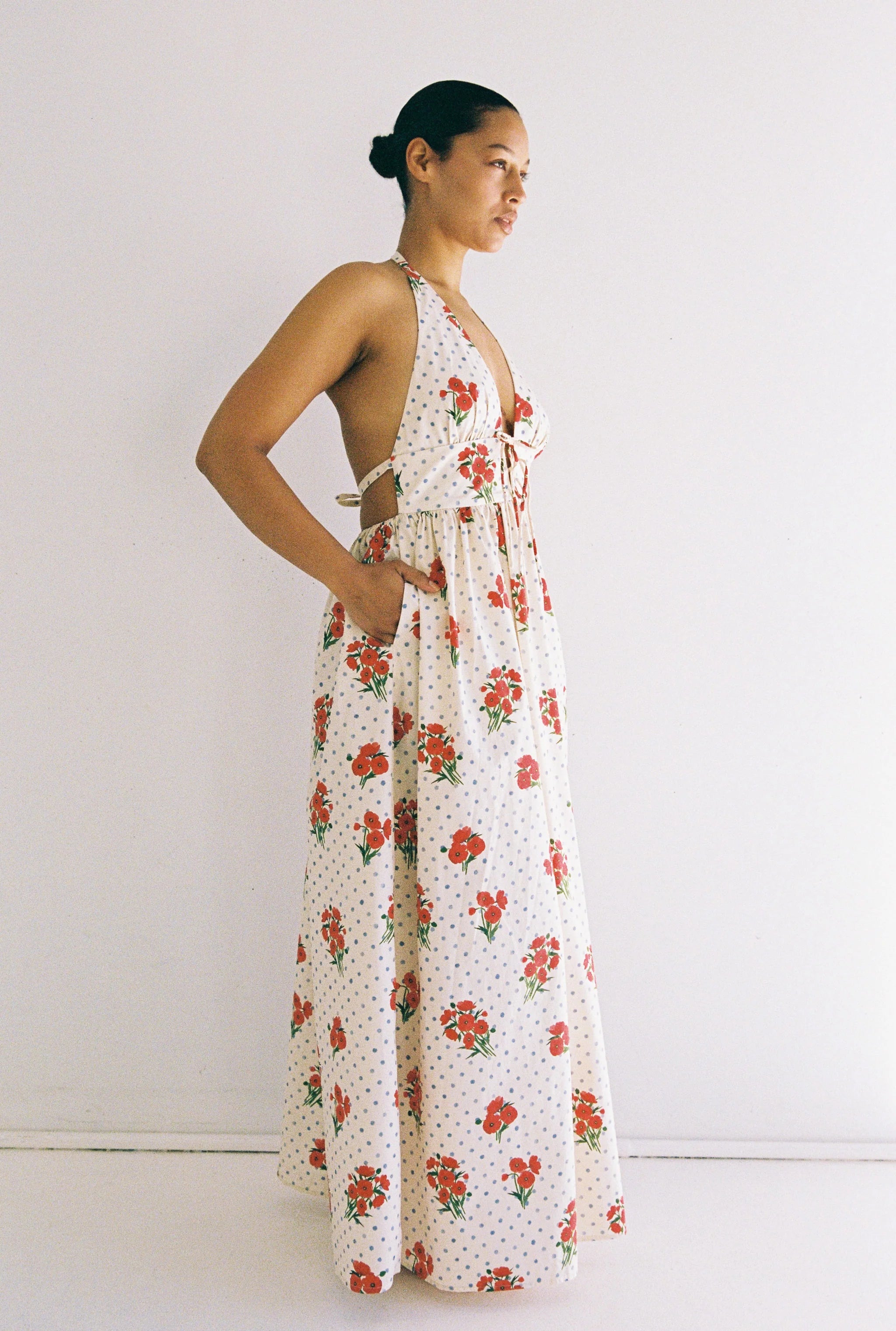side profile of lady wearing Lily Maxi Dress Poppies by JUNI