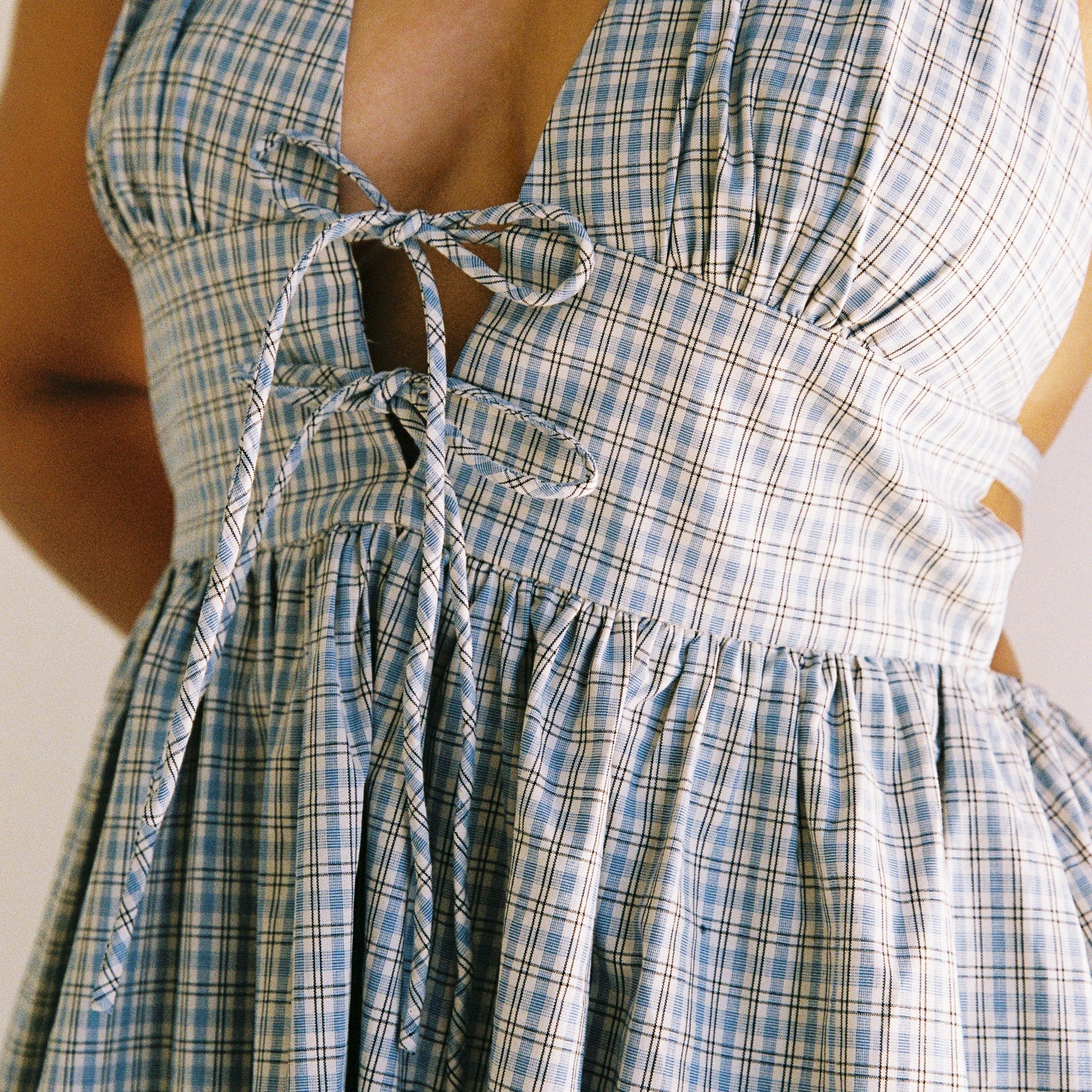 close up details of Lily midi dress blue check by JUNI