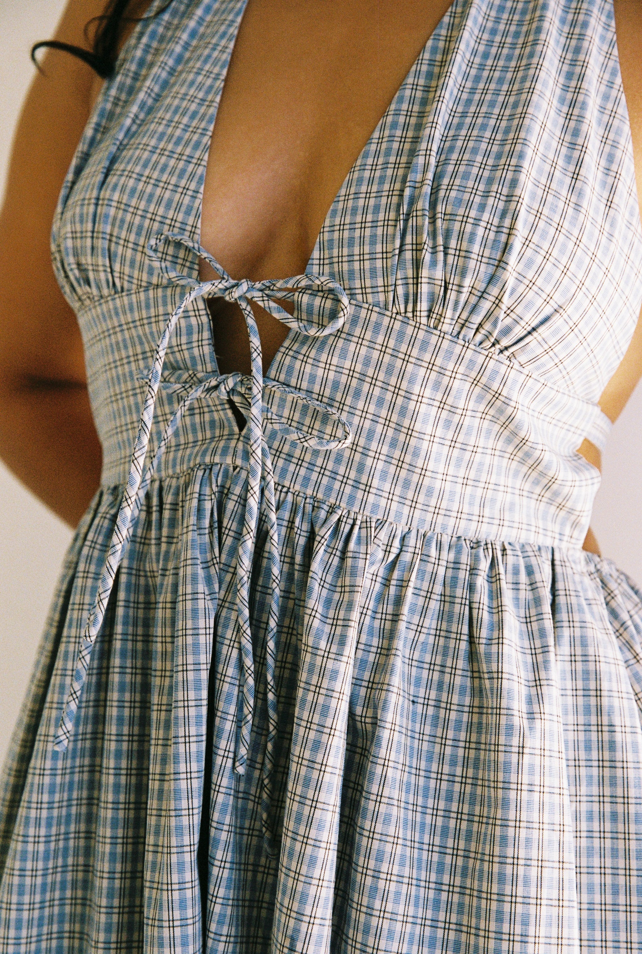 close up details of Lily midi dress blue check by JUNI