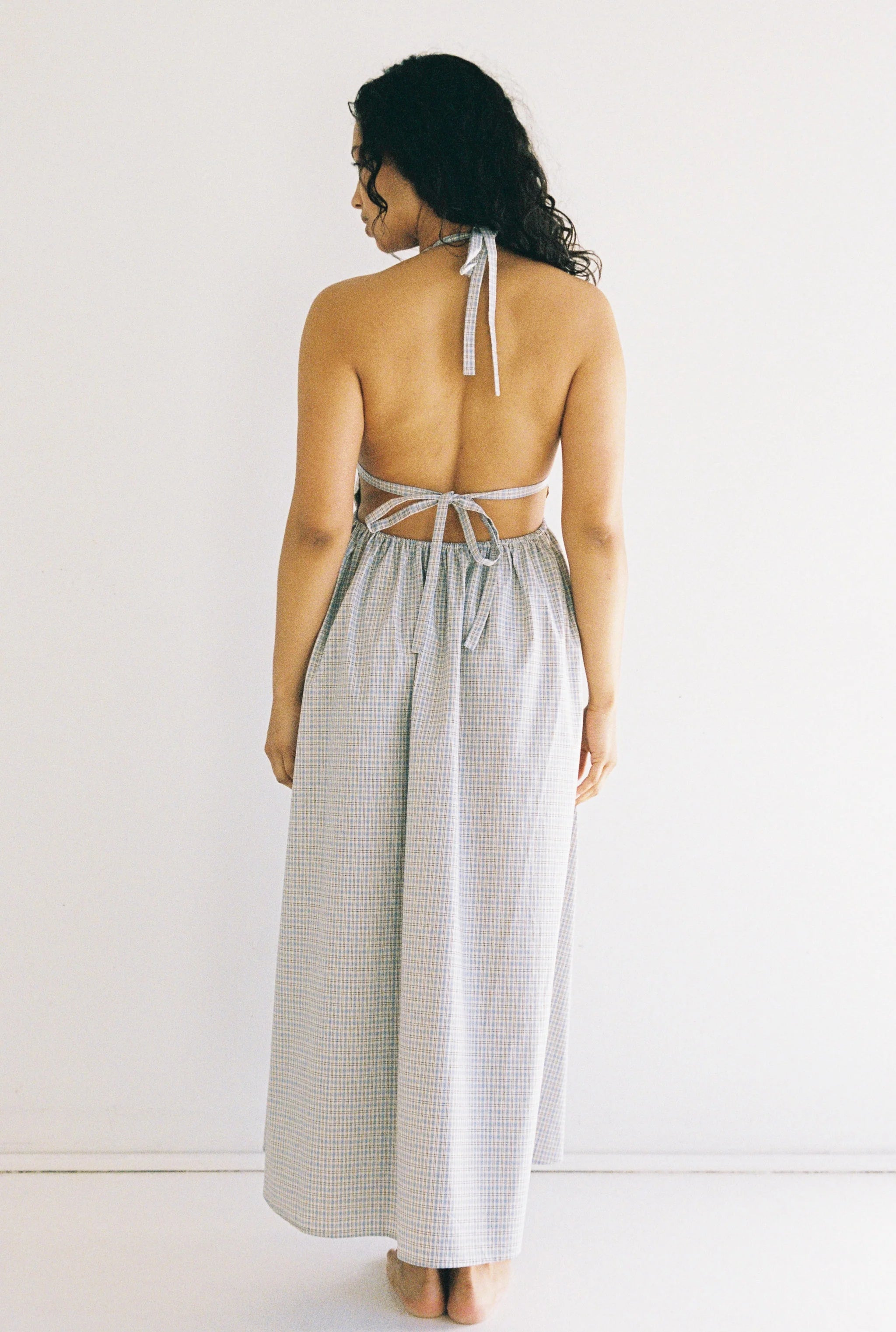 women wearing the Lily midi dress blue check by JUNI