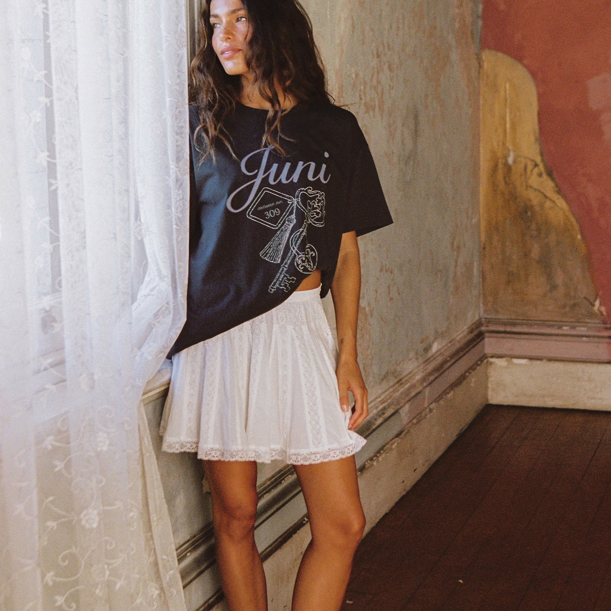 model wearing Juni Lock Tee organic cotton oversized fit black