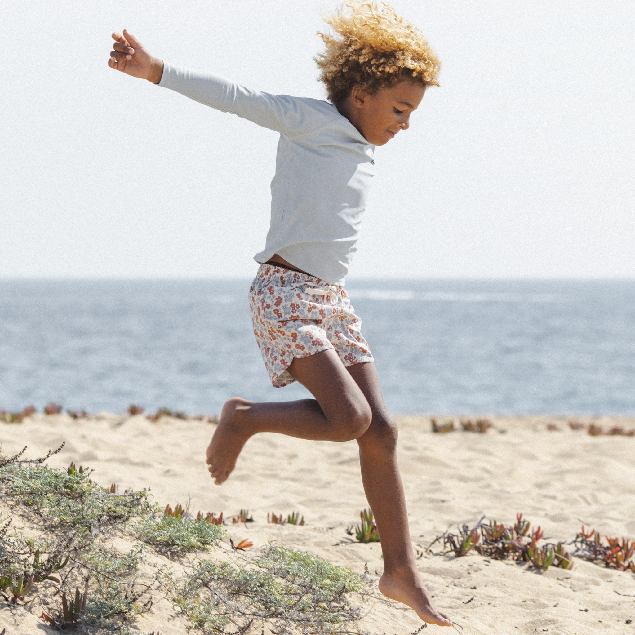 Boy wearing the Long Sleeve Rashguard Light Blue | Rylee + Cru