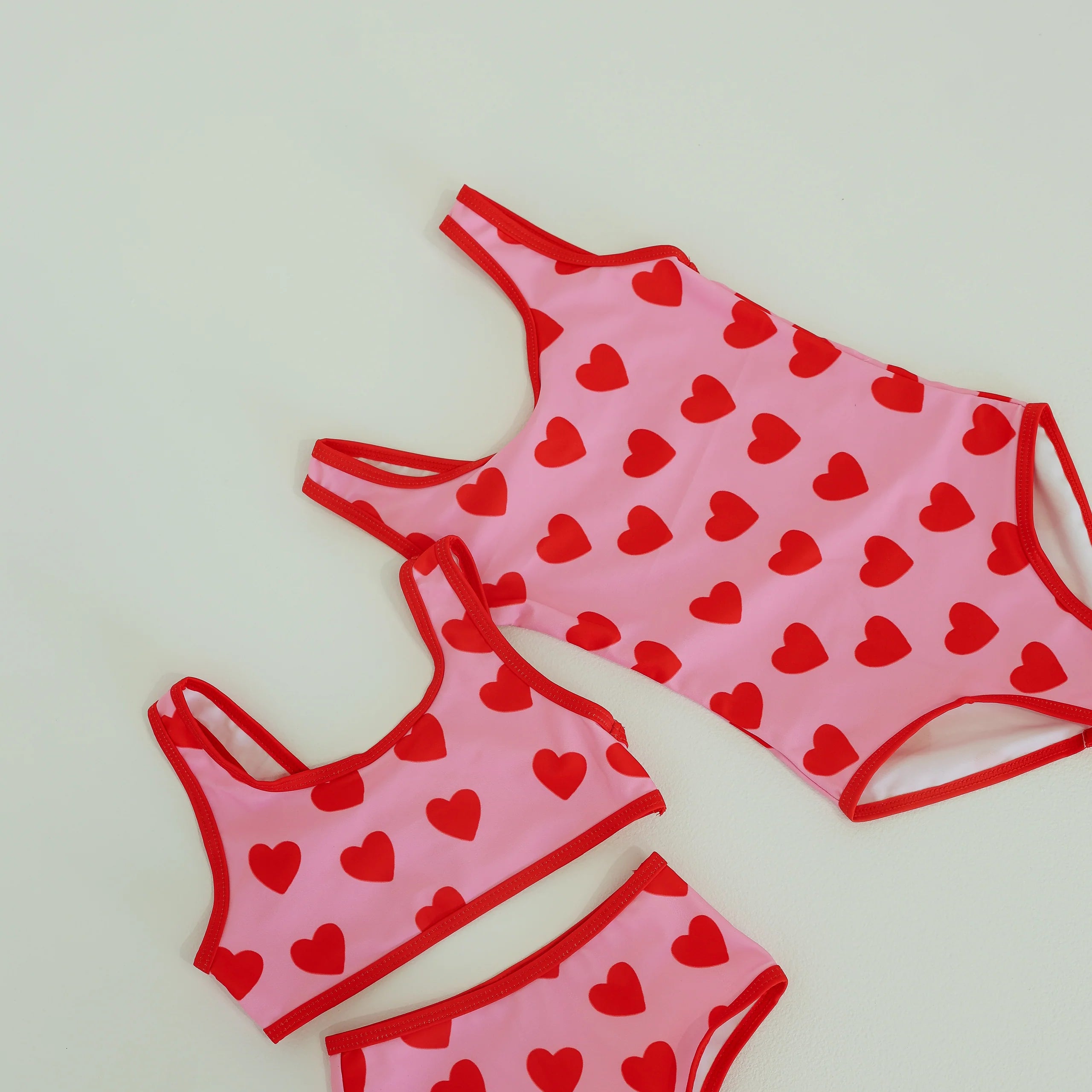 girls swimsuits - pink with red hearts