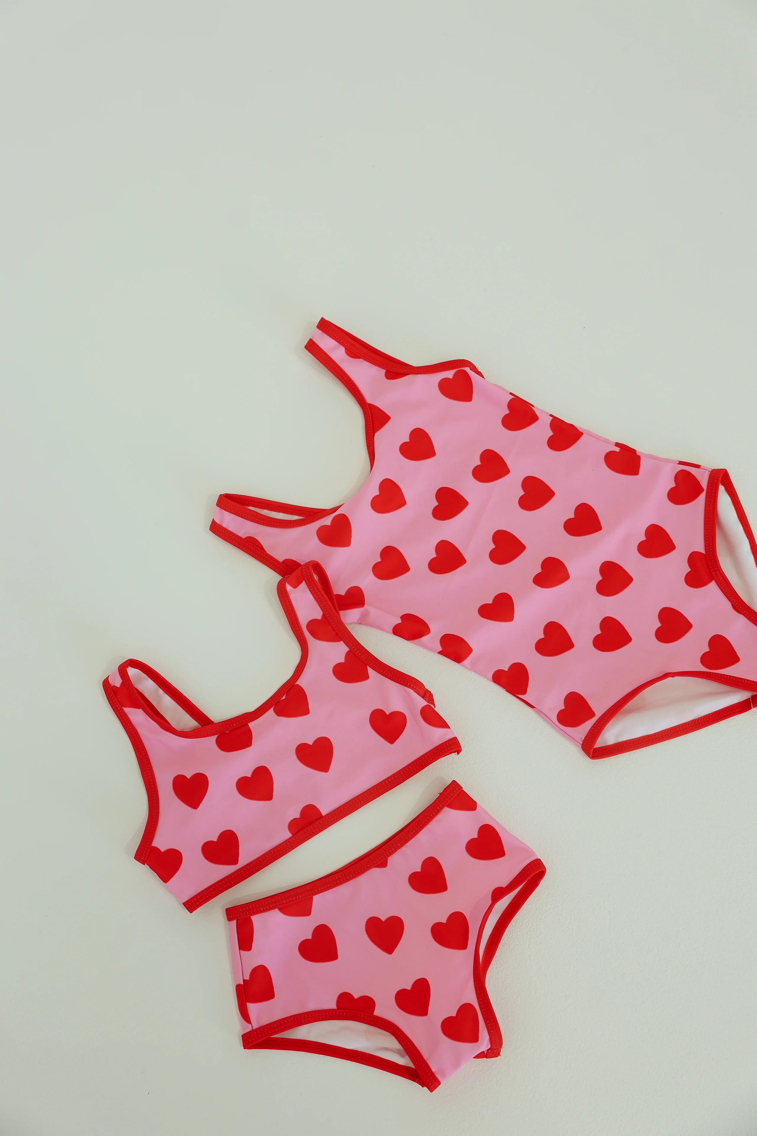 girls swimsuits - pink with red hearts
