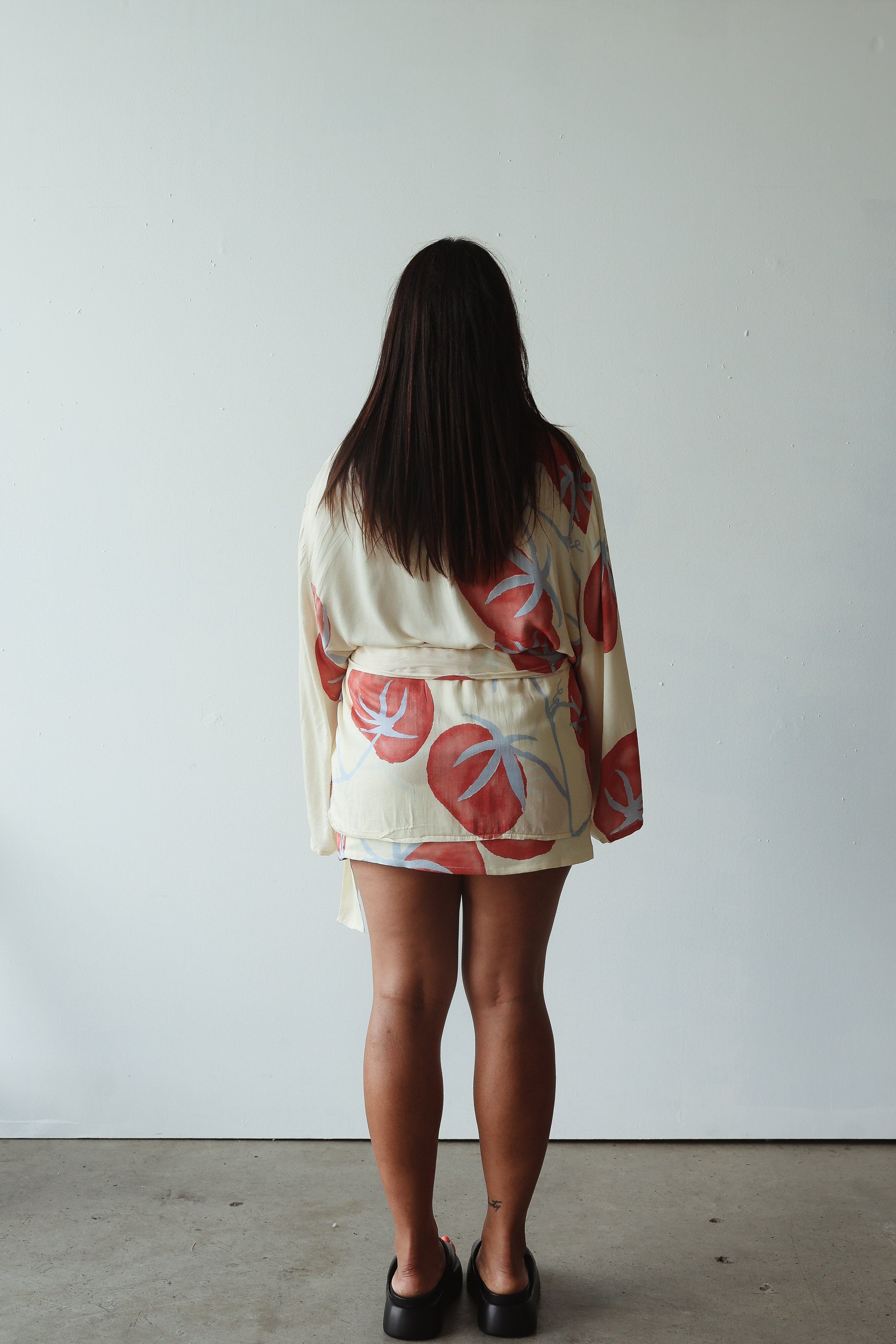 back view of model wearing Luella Kimono - Tomato Print by By Billie