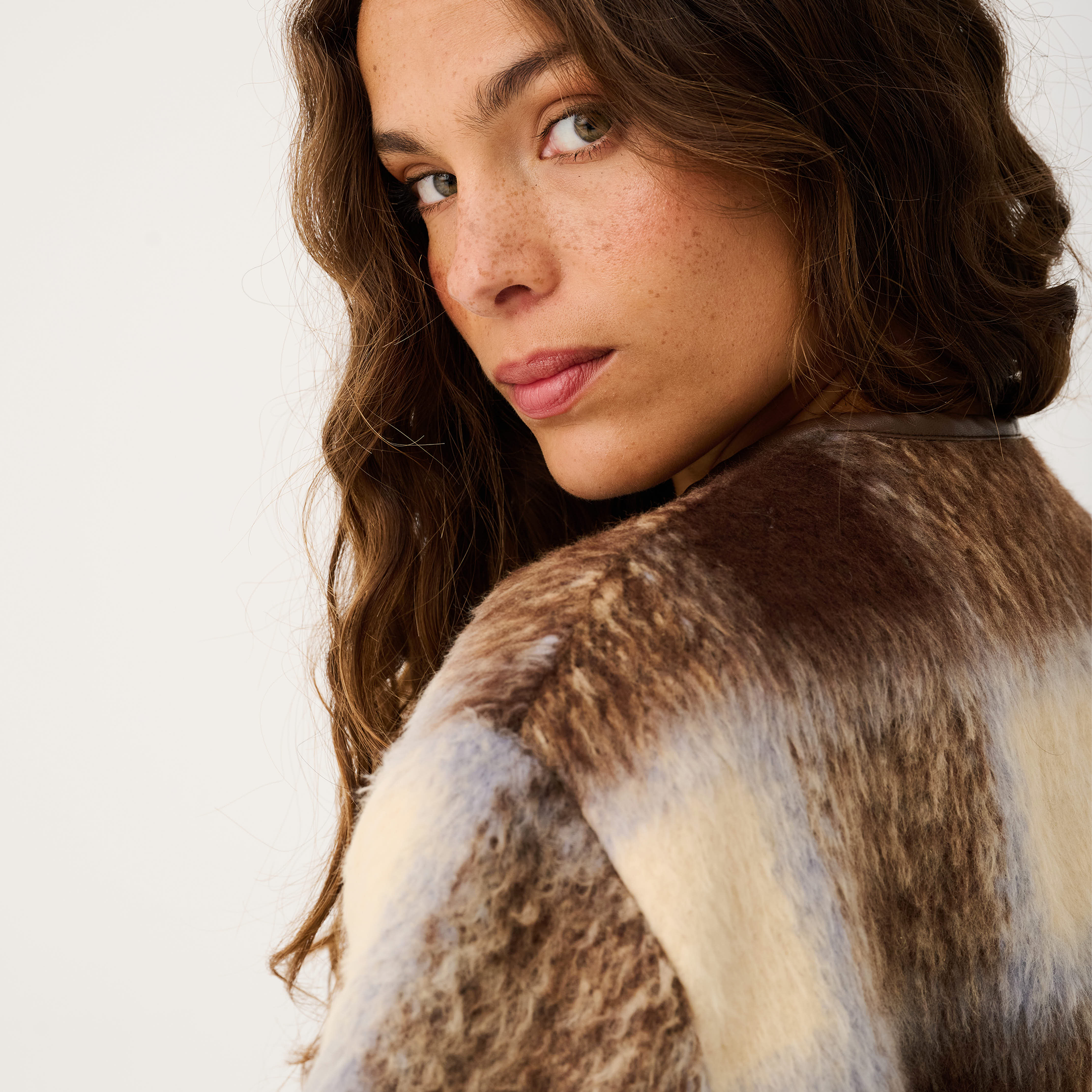 Over shoulder detail shot of Luka Jacket showing soft faux fur check pattern texture