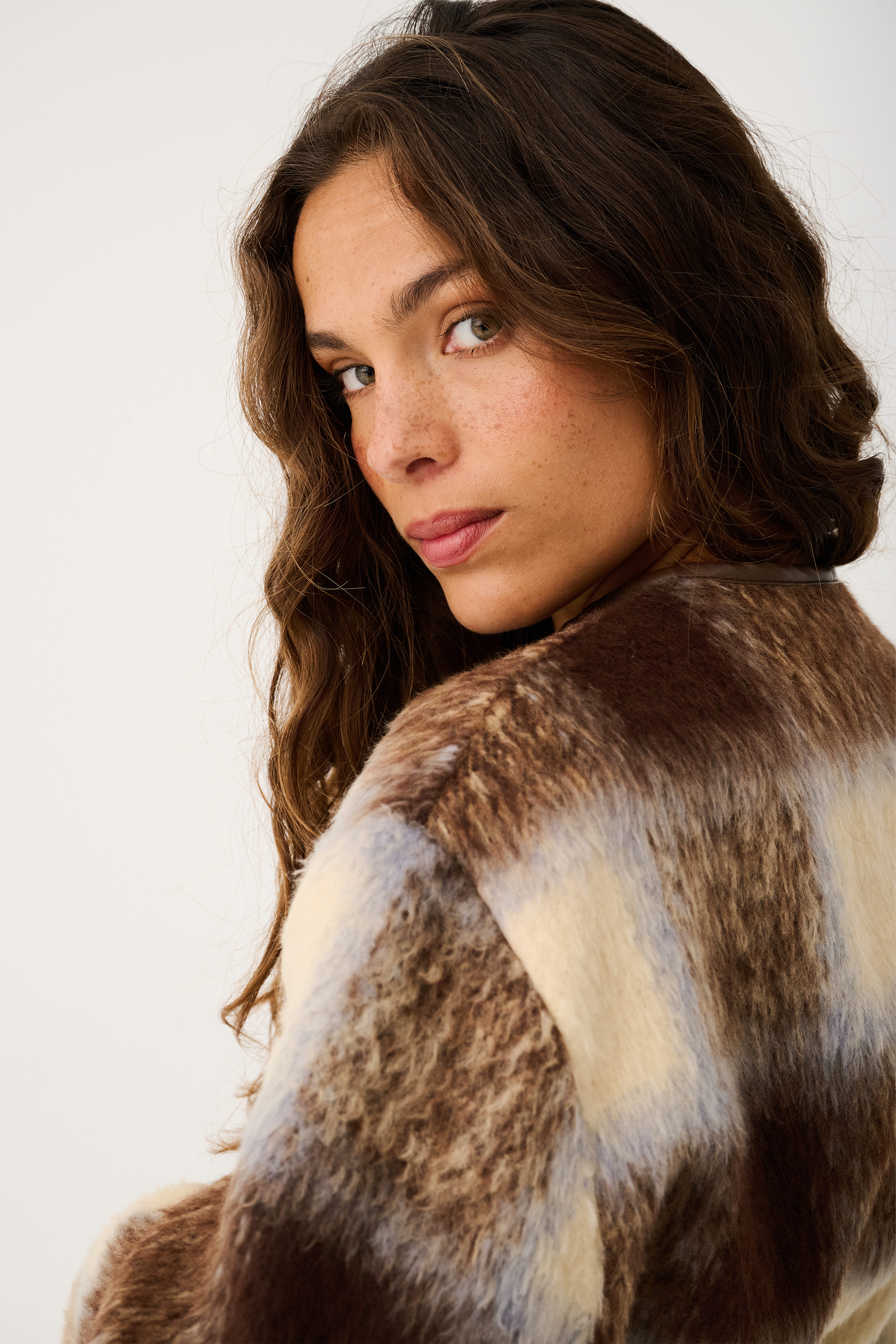 Over shoulder detail shot of Luka Jacket showing soft faux fur check pattern texture