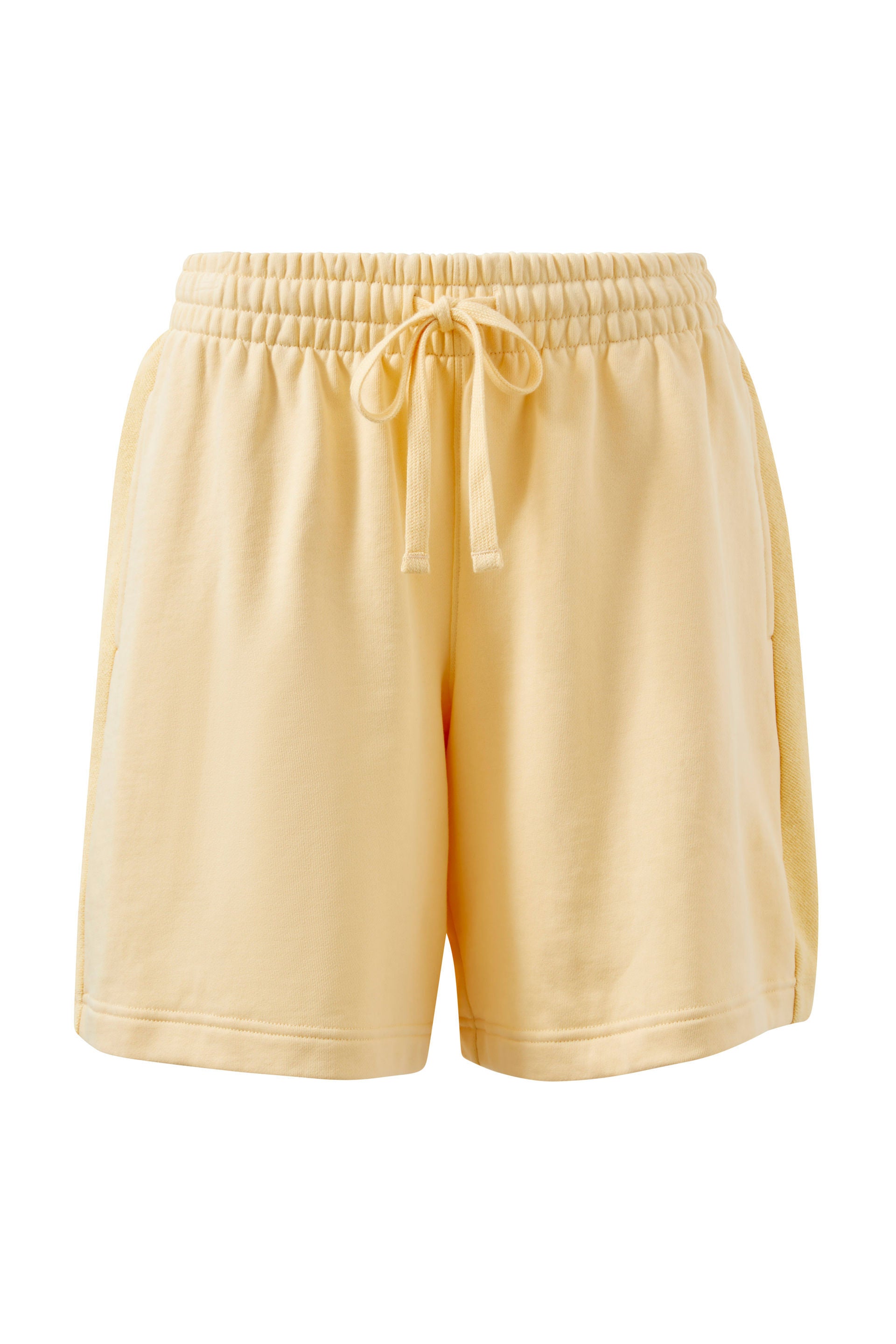 Flat lay of Lulu reverse panel short sunny yellow by Ceres Life