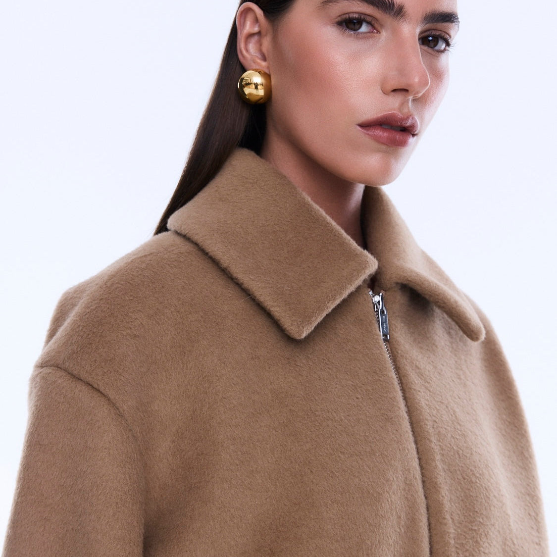 Close-up of Maeve Wool Blend Bomber showing camel colored wool texture and zip front collar detail