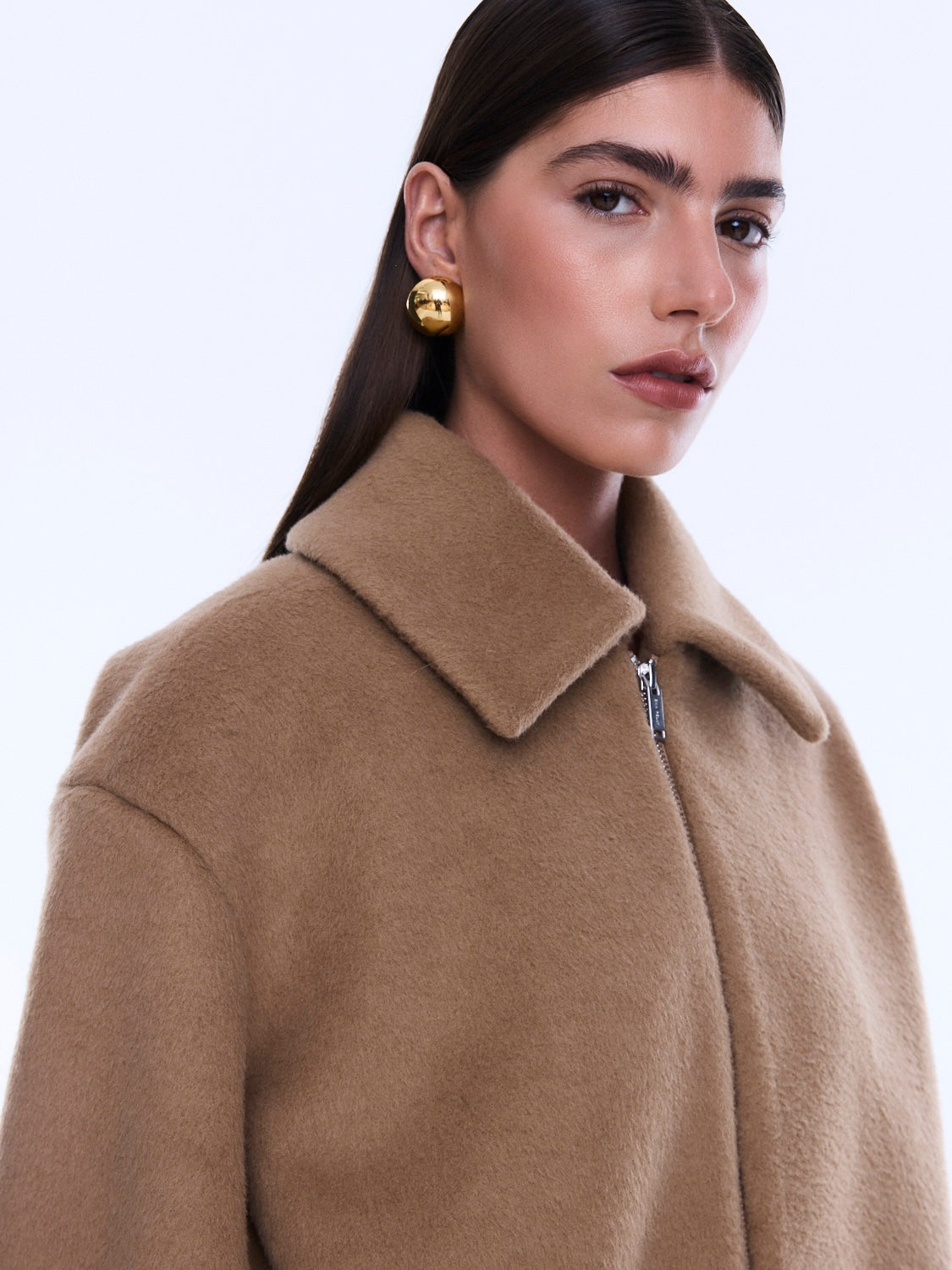 Close-up of Maeve Wool Blend Bomber showing camel colored wool texture and zip front collar detail