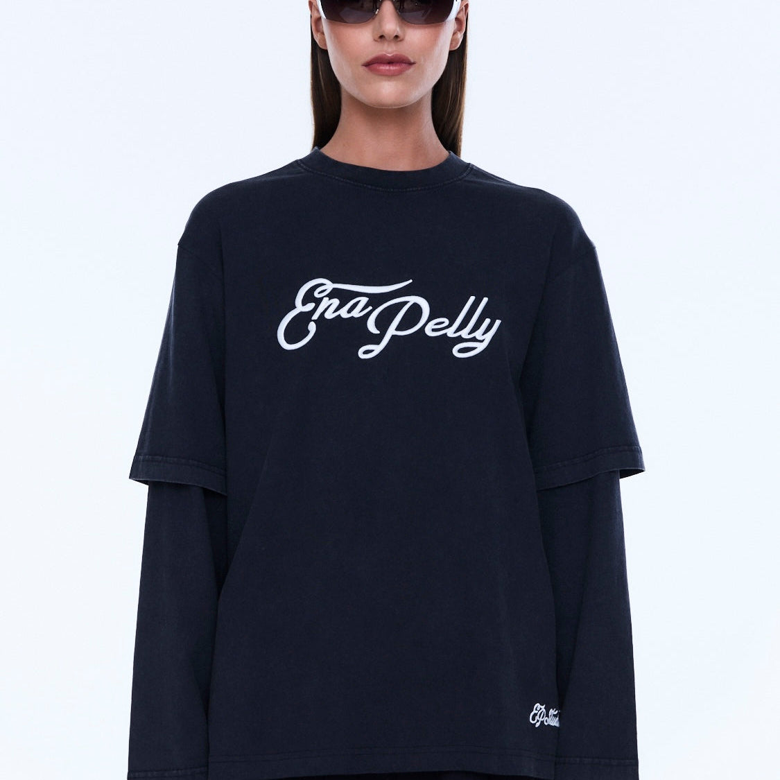 Front close-up of Mock Layer Long Sleeve Tee highlighting white script branding and crew neckline