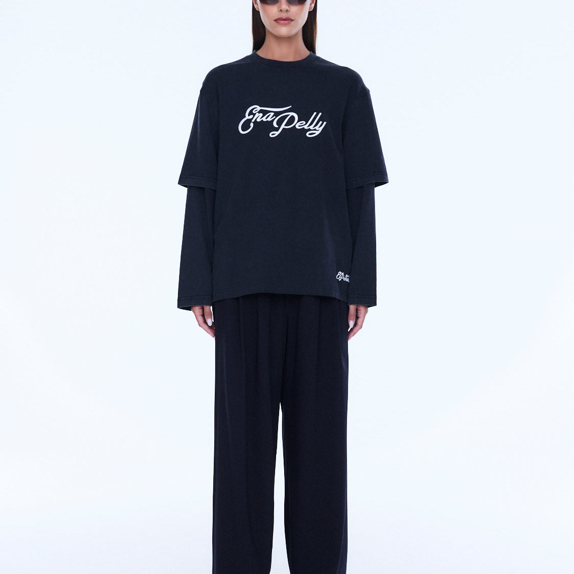 Full front view of Mock Layer Long Sleeve Tee in vintage black with white logo and layered sleeves