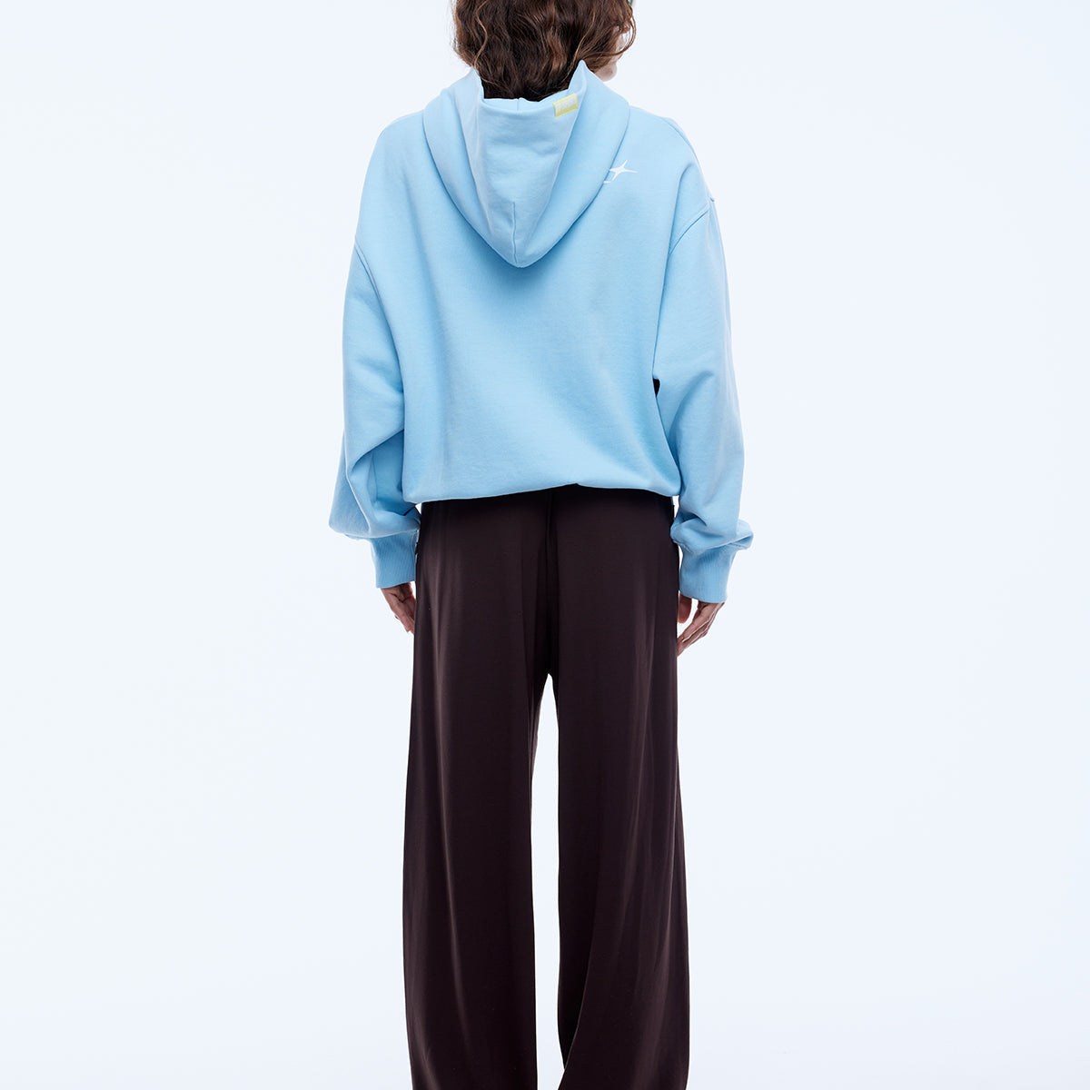 Back view of cloud blue hoodie showing plain back design and hood construction