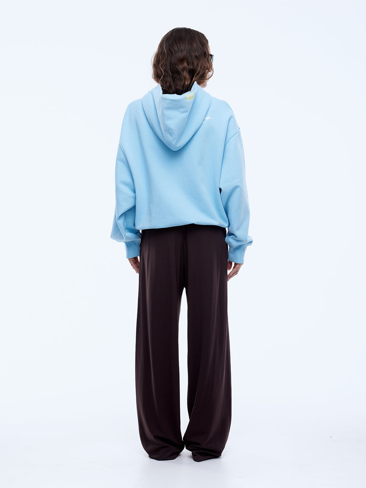 Back view of cloud blue hoodie showing plain back design and hood construction