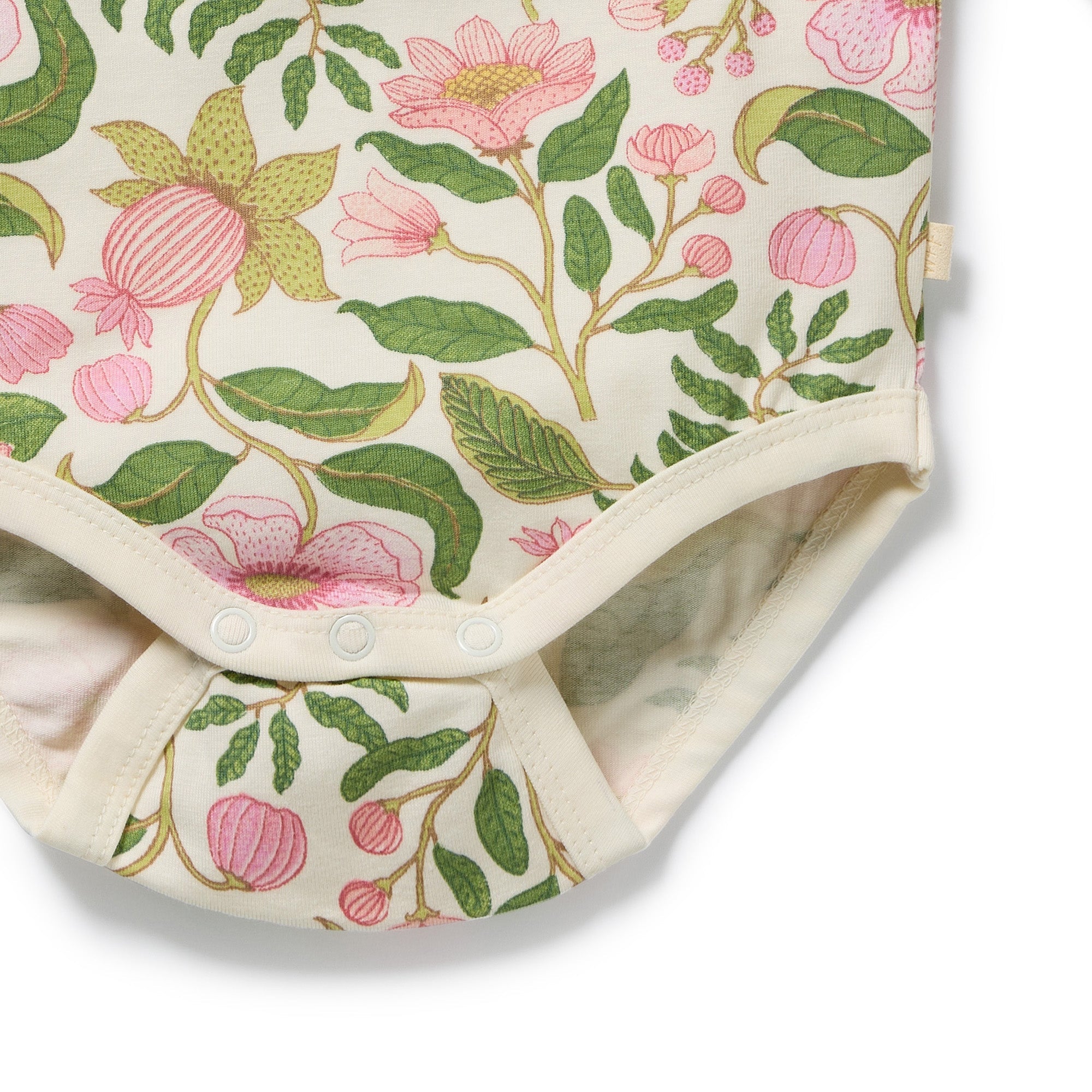 Close up of bottom button clasp on the Ma Fleur Organic Bodysuit | Wilson + Frenchy