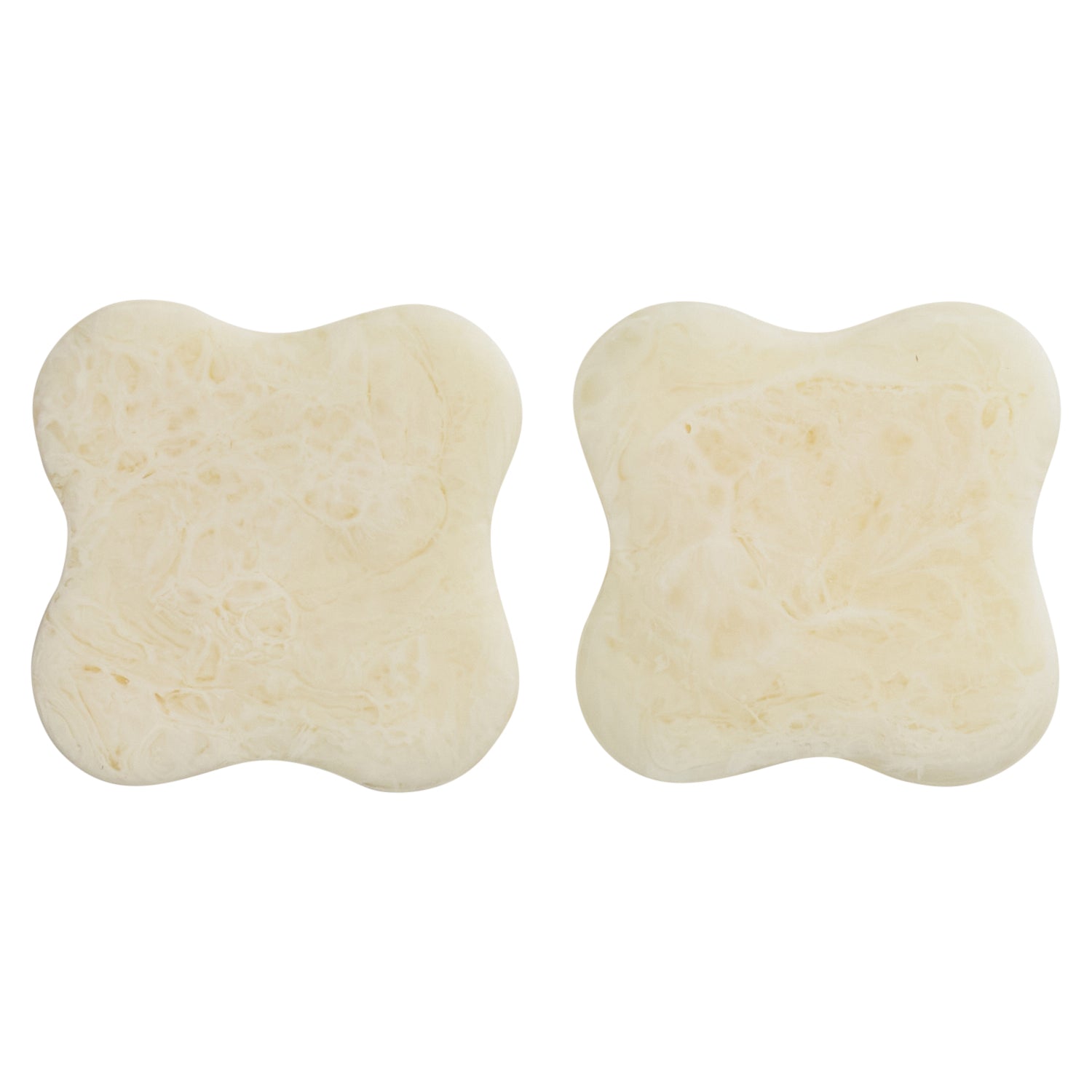 Set of 2 pearl cream marbled resin coasters with curved square shape, soft ivory texture, front view