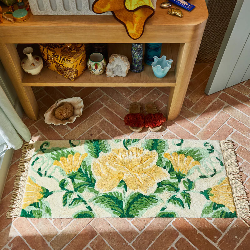 Margaret Bath Runner by Sage & Clare - long floral bath runner with a floral design in green and yellow on a cream base. Fringed edges