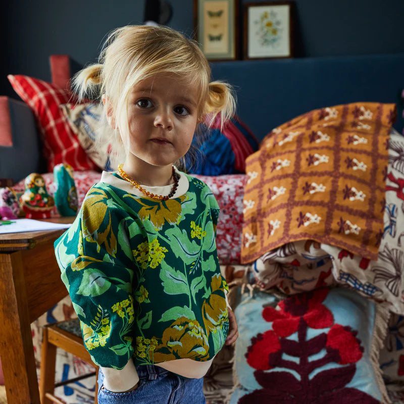 girl wearing Margot Kids Sweater by Sage & Clare