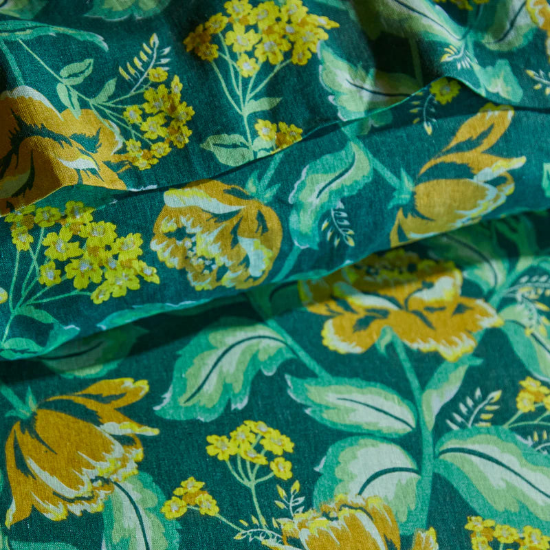 Beautiful floral linen details - green and yellow floral print bed linen