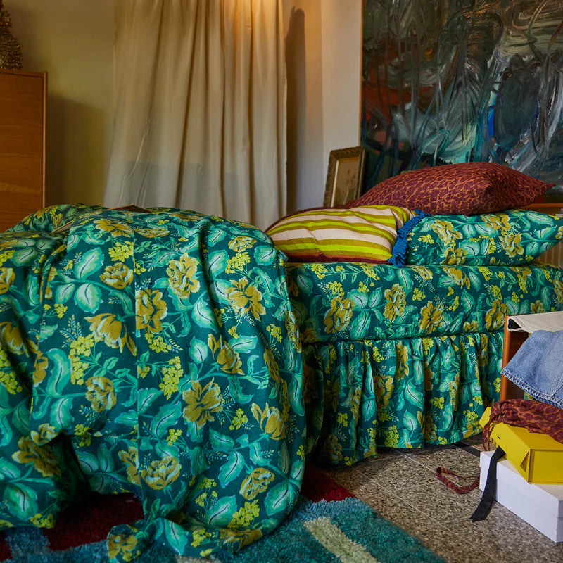 Floral green and yellow linen bedspread by Sage & Clare
