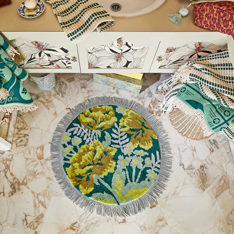 organic cotton bath mat with fringe & retro floral print in green and yellow