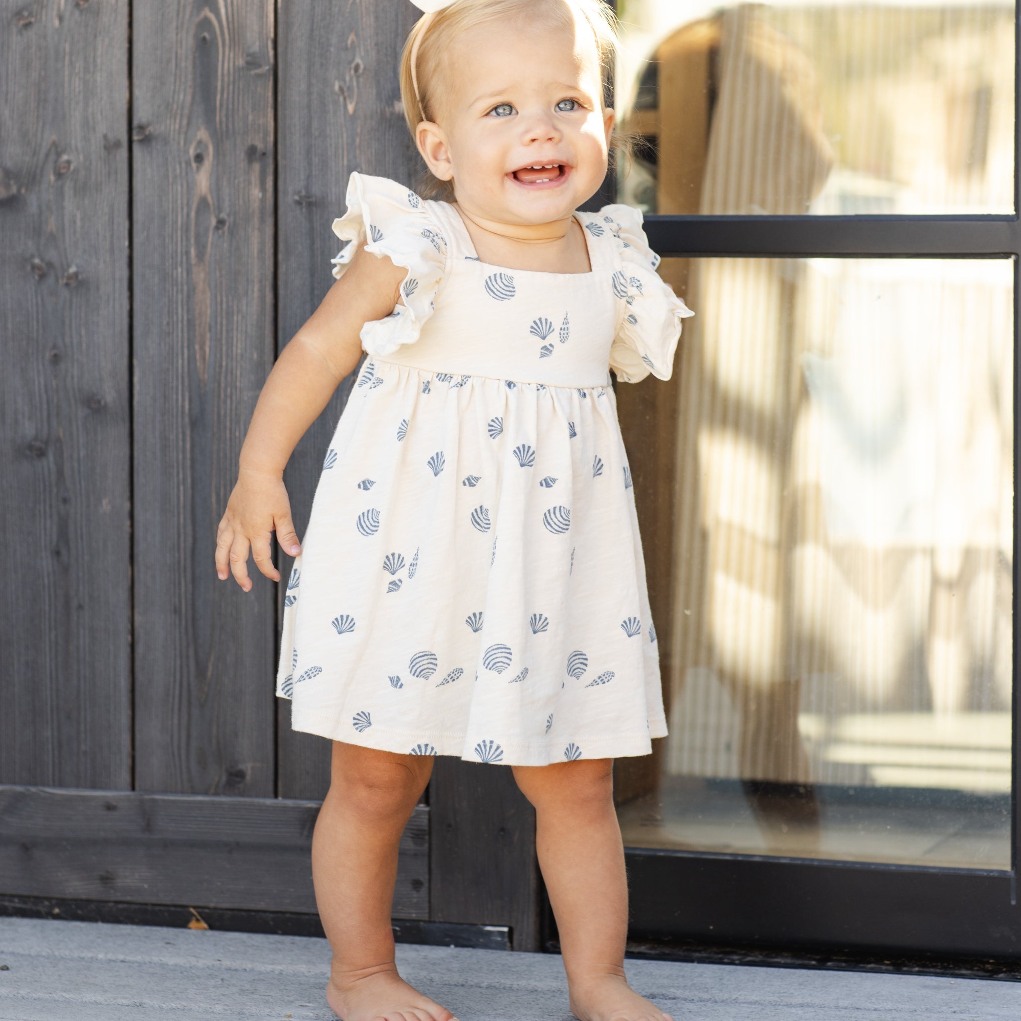 Toddler wearing Mariposa Seashell Dress | Rylee + Cru