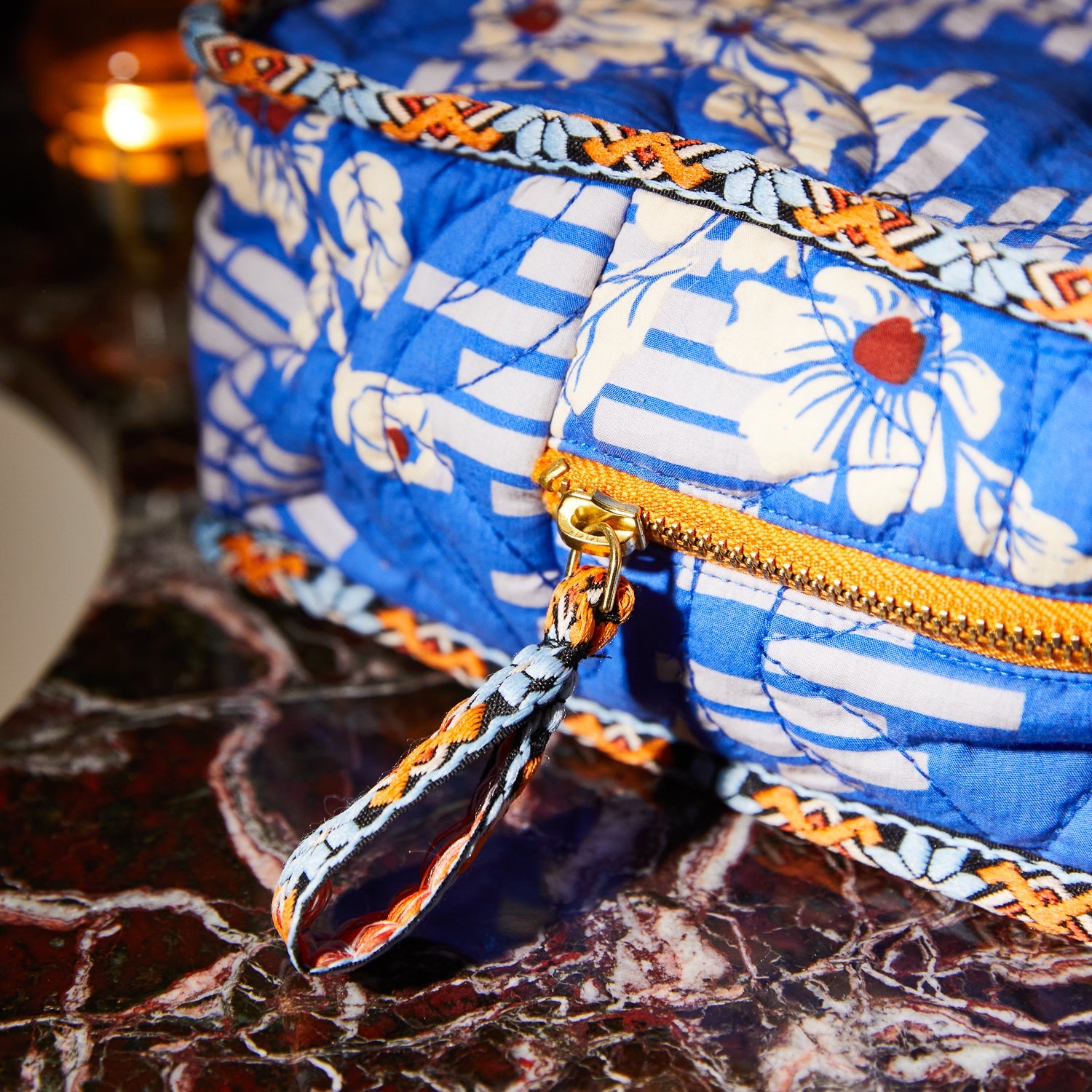 Close up of GOTS certified organic cotton quilted texture on Sage & Clare vanity bag