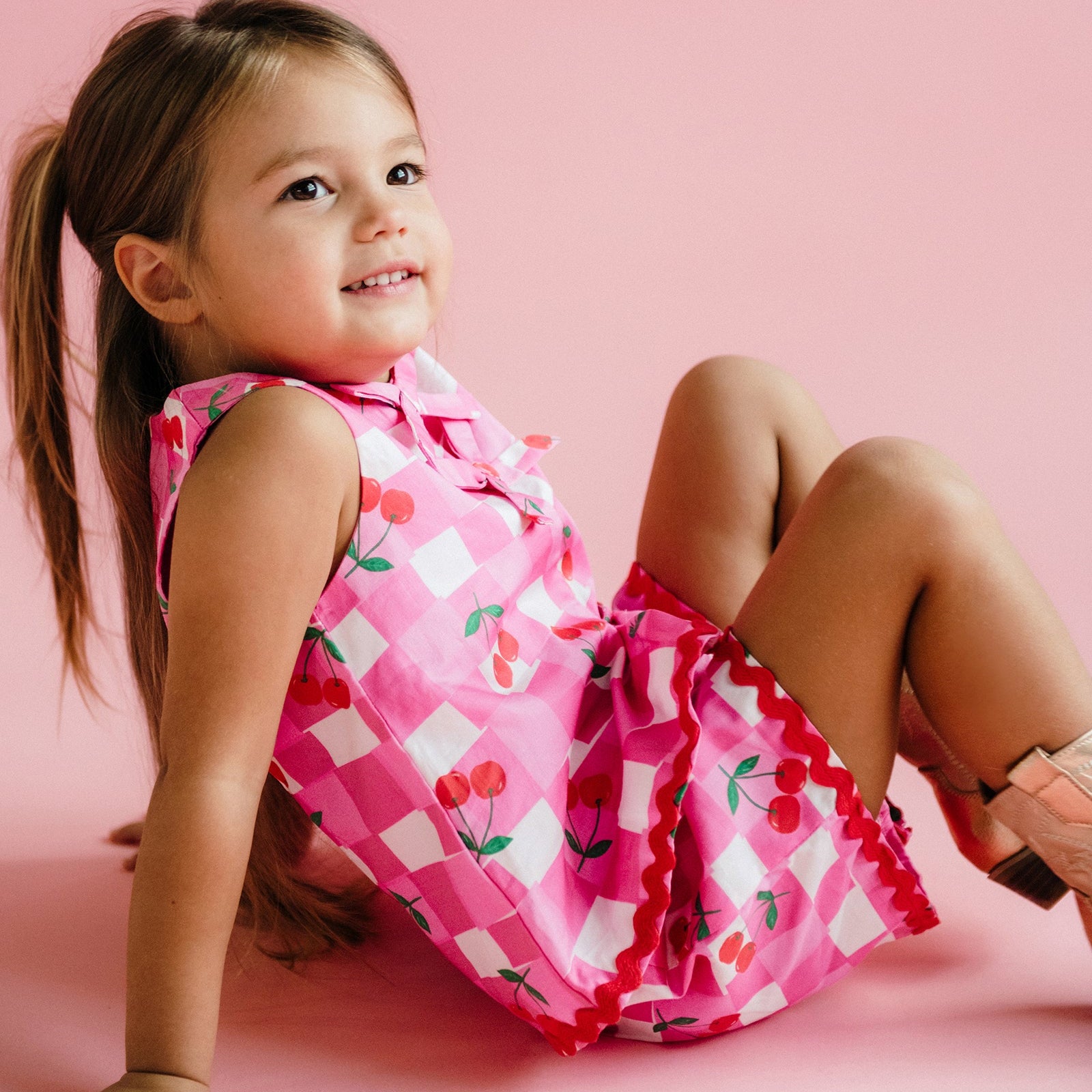 Side view of girl wearing the Mary Woven Set - Gingham | Rock Your Baby