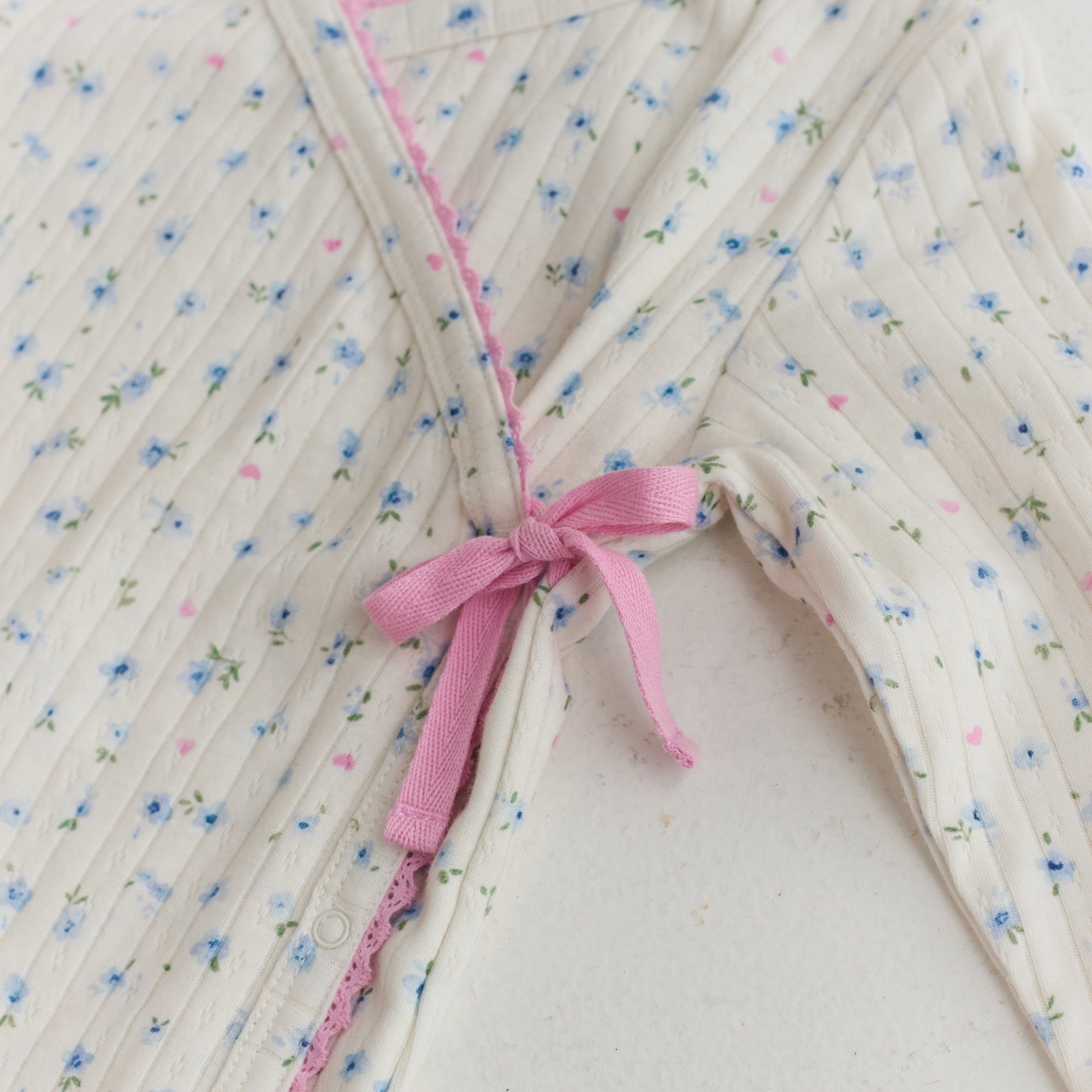 Juni organic cotton baby onesie pointelle fabric Australia