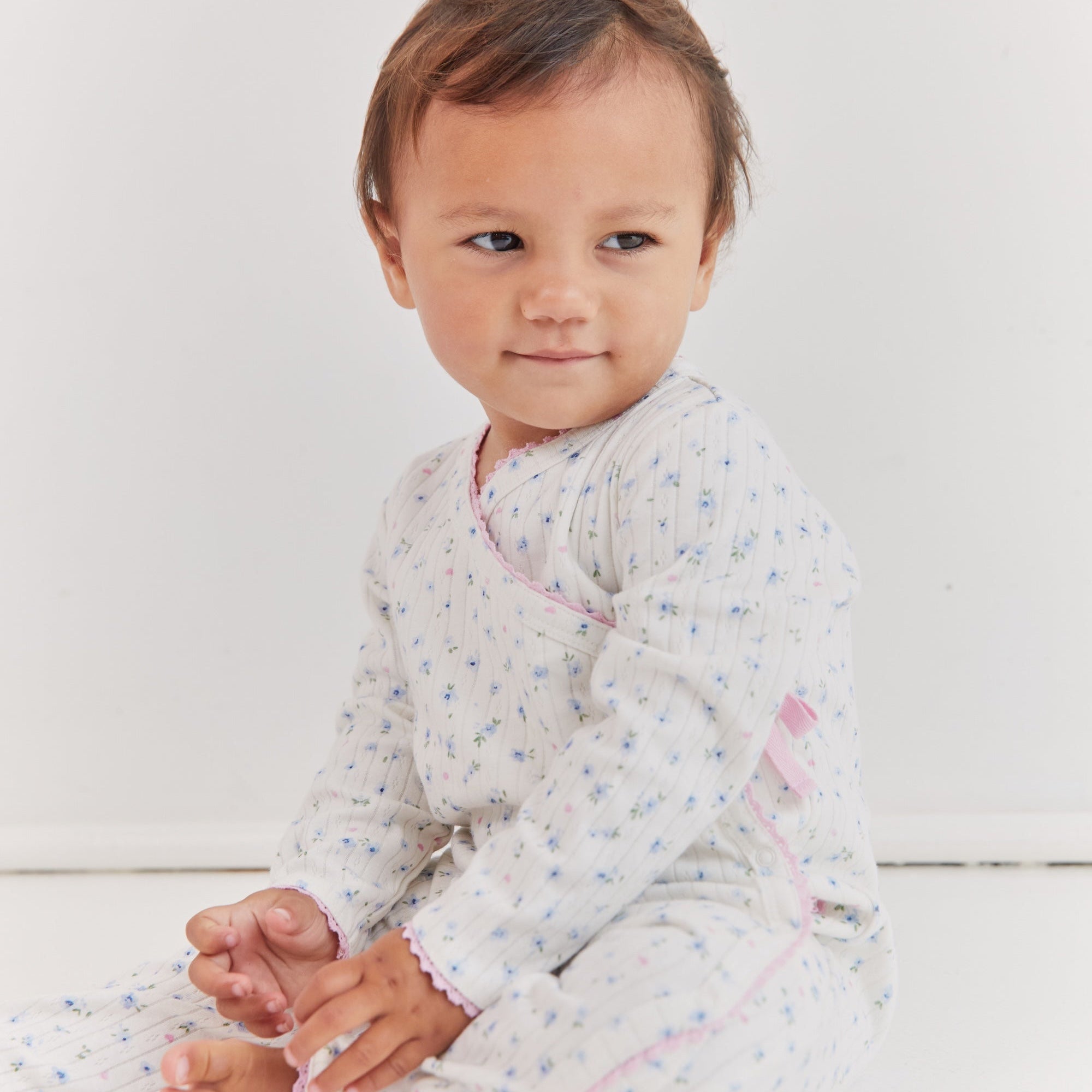 Long sleeve wrap onesie with lace trim ditsy bloom print