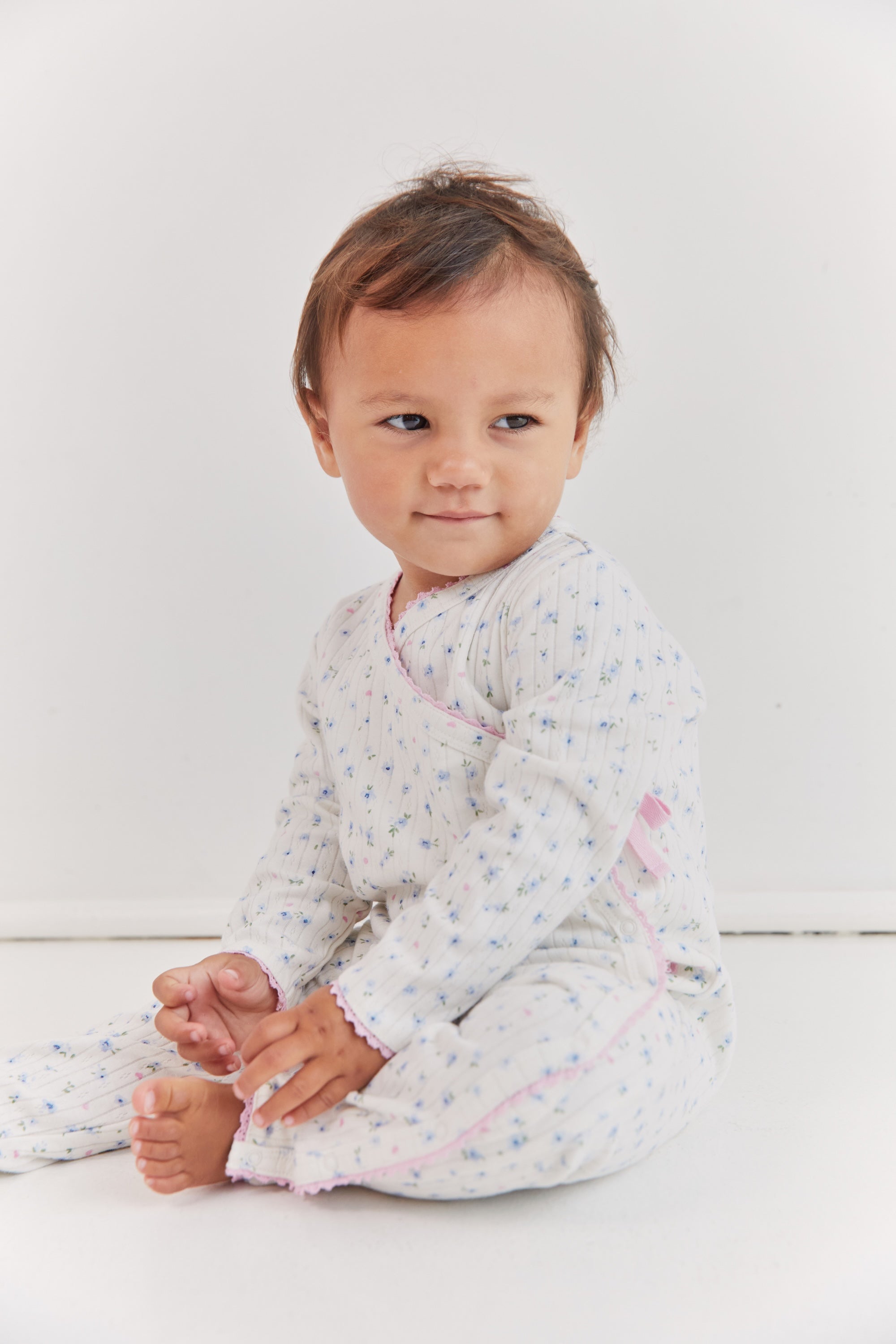 Long sleeve wrap onesie with lace trim ditsy bloom print