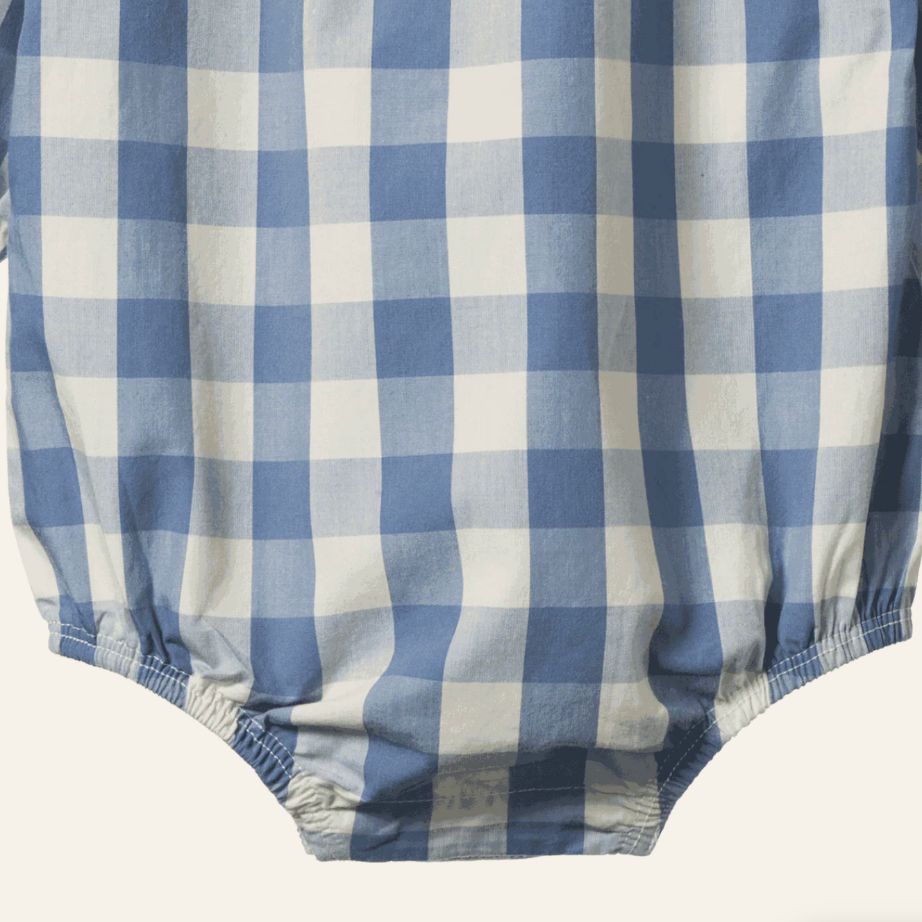 Close up of the Meadow Bodysuit Gingham - Bluebelle Check | Nature Baby