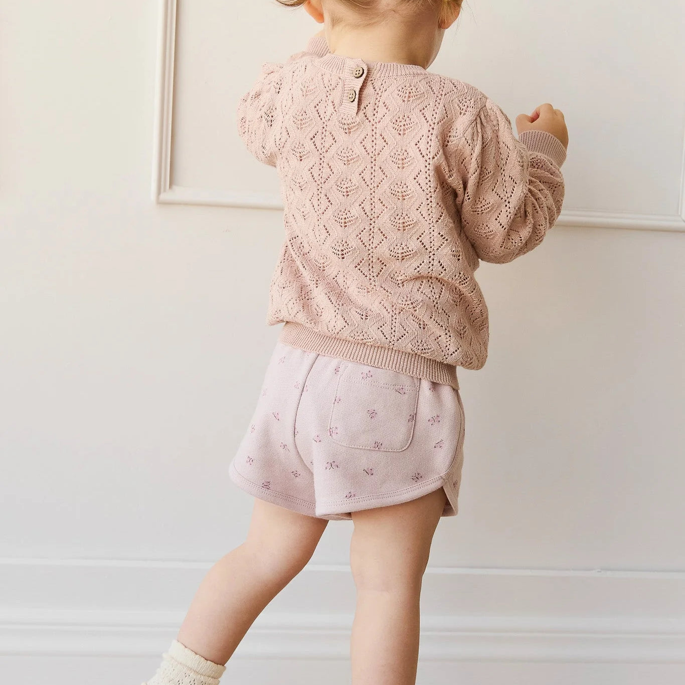 Girl wearing 100% cotton Mila Cotton Knit Jumper Chalky pink Jamie Kay