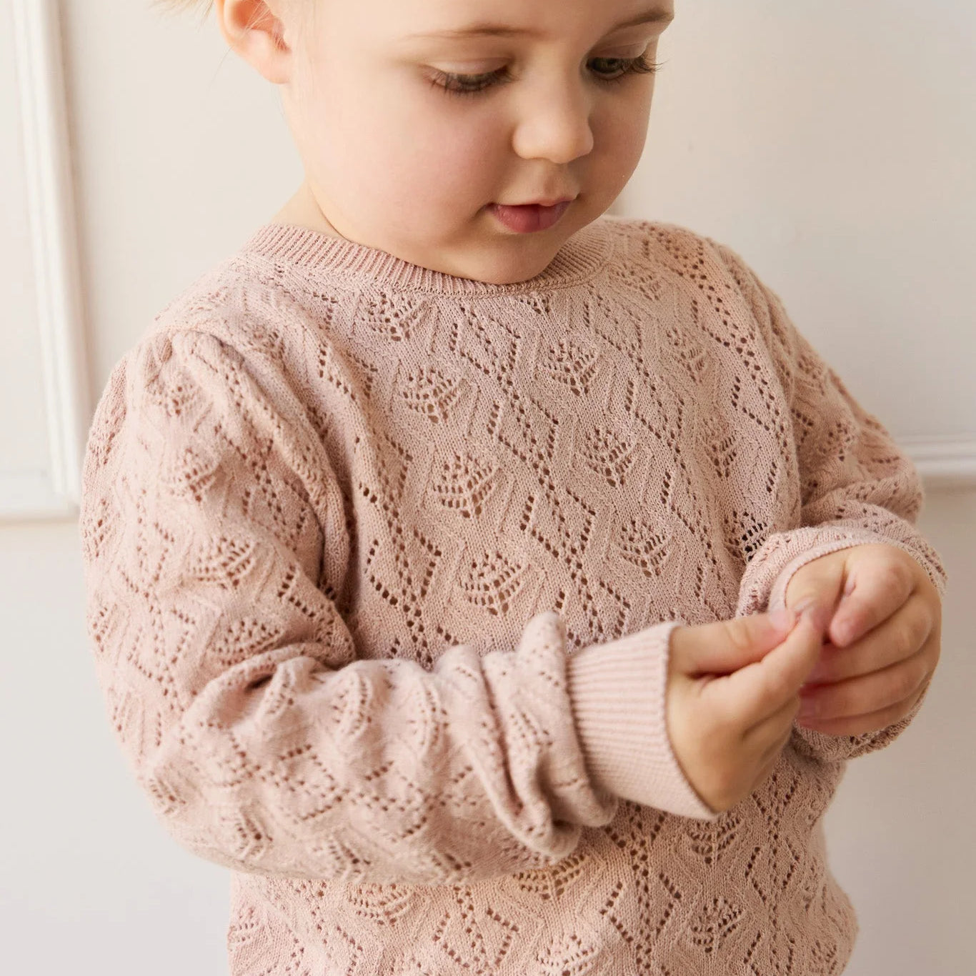 Girls soft pink knit sweater by Jamie Kay