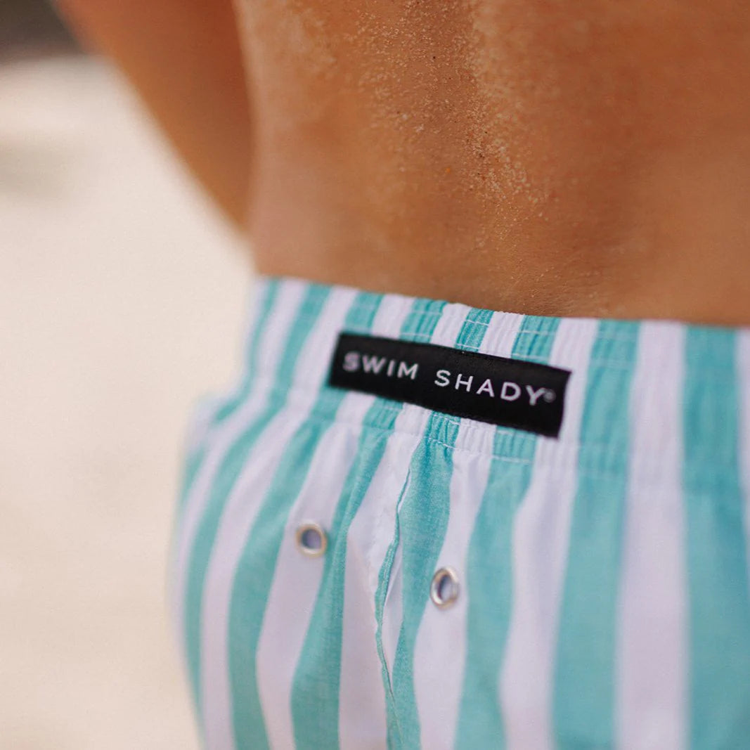 close up label detail of mens board shorts - Mint Flare Swim Shorts by Swim Shady