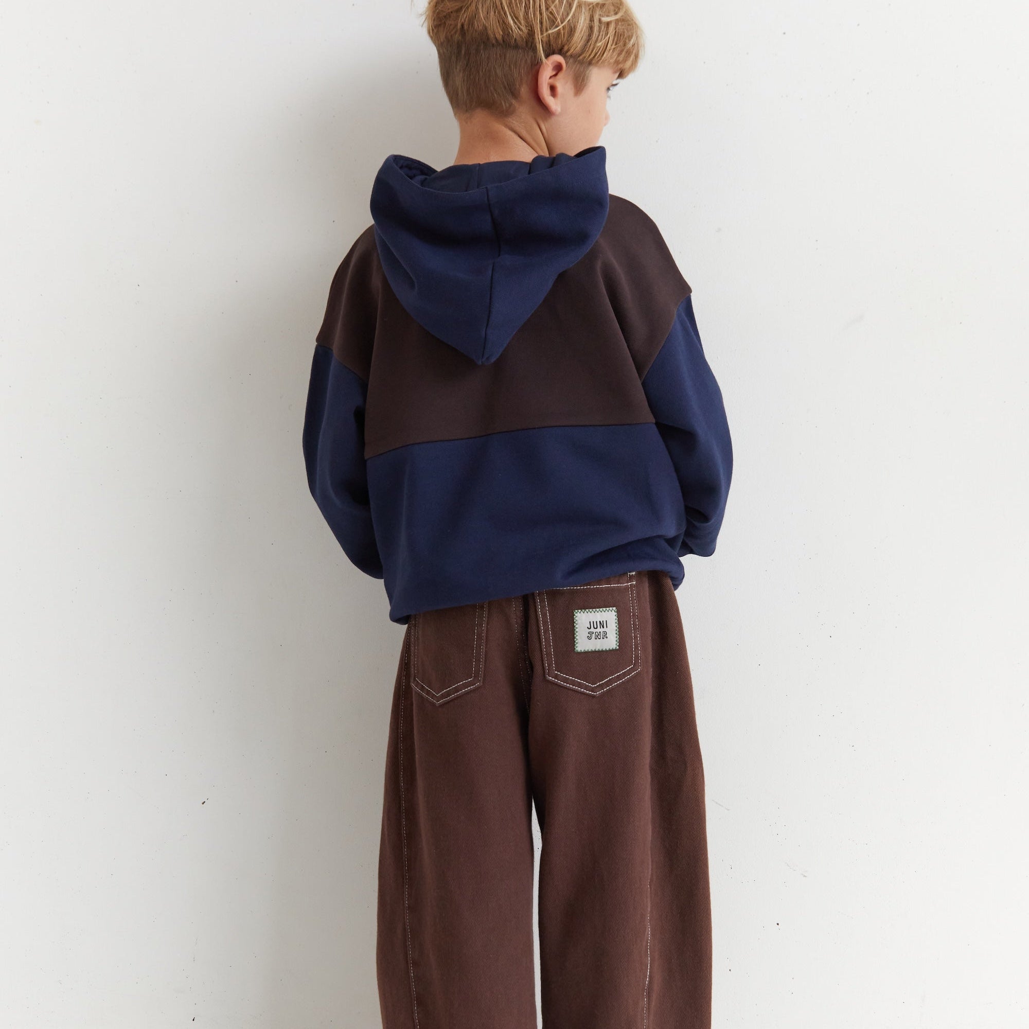 Back view of the Mio Hoodie - Navy | Juni