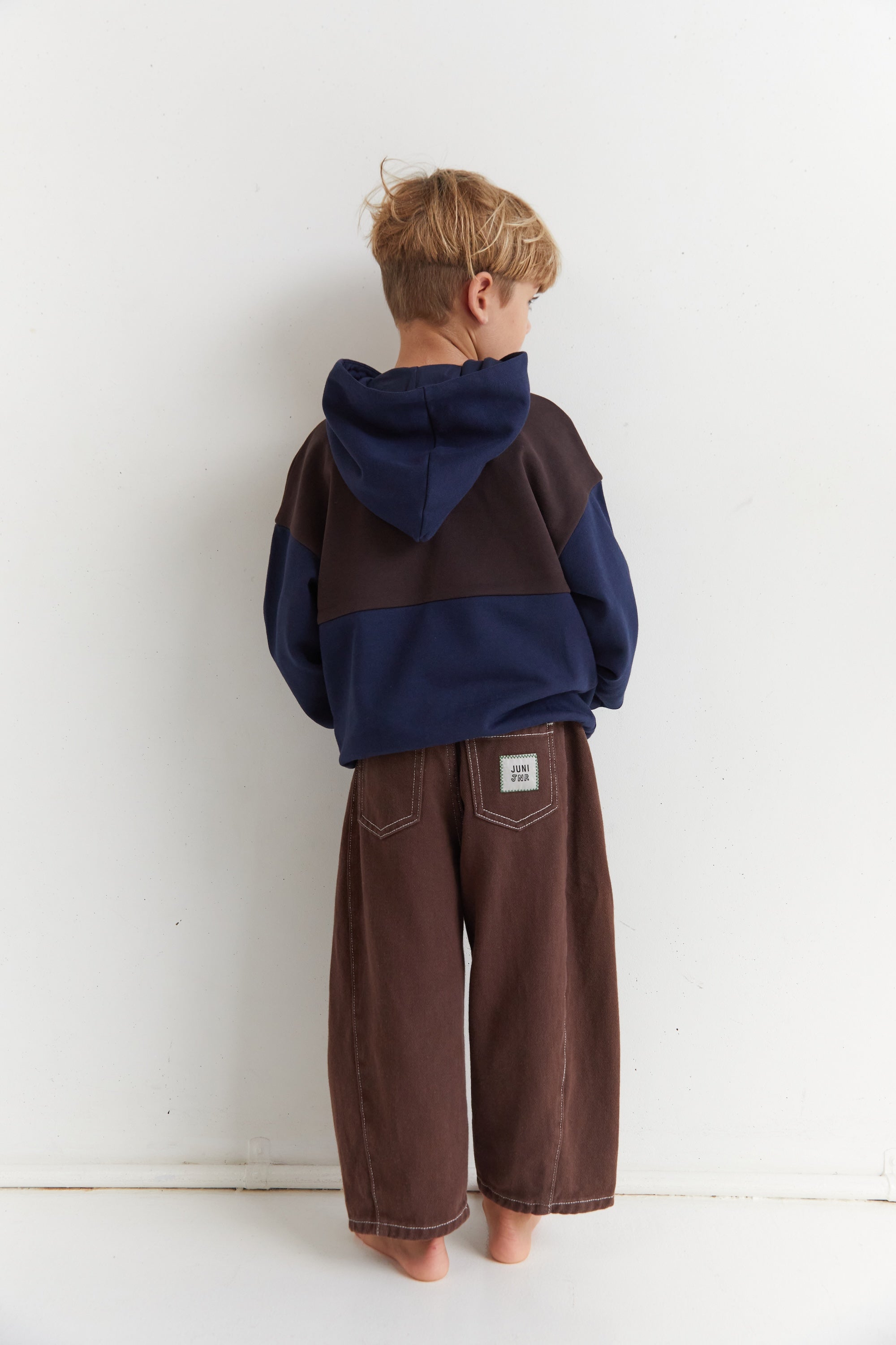 Back view of the Mio Hoodie - Navy | Juni