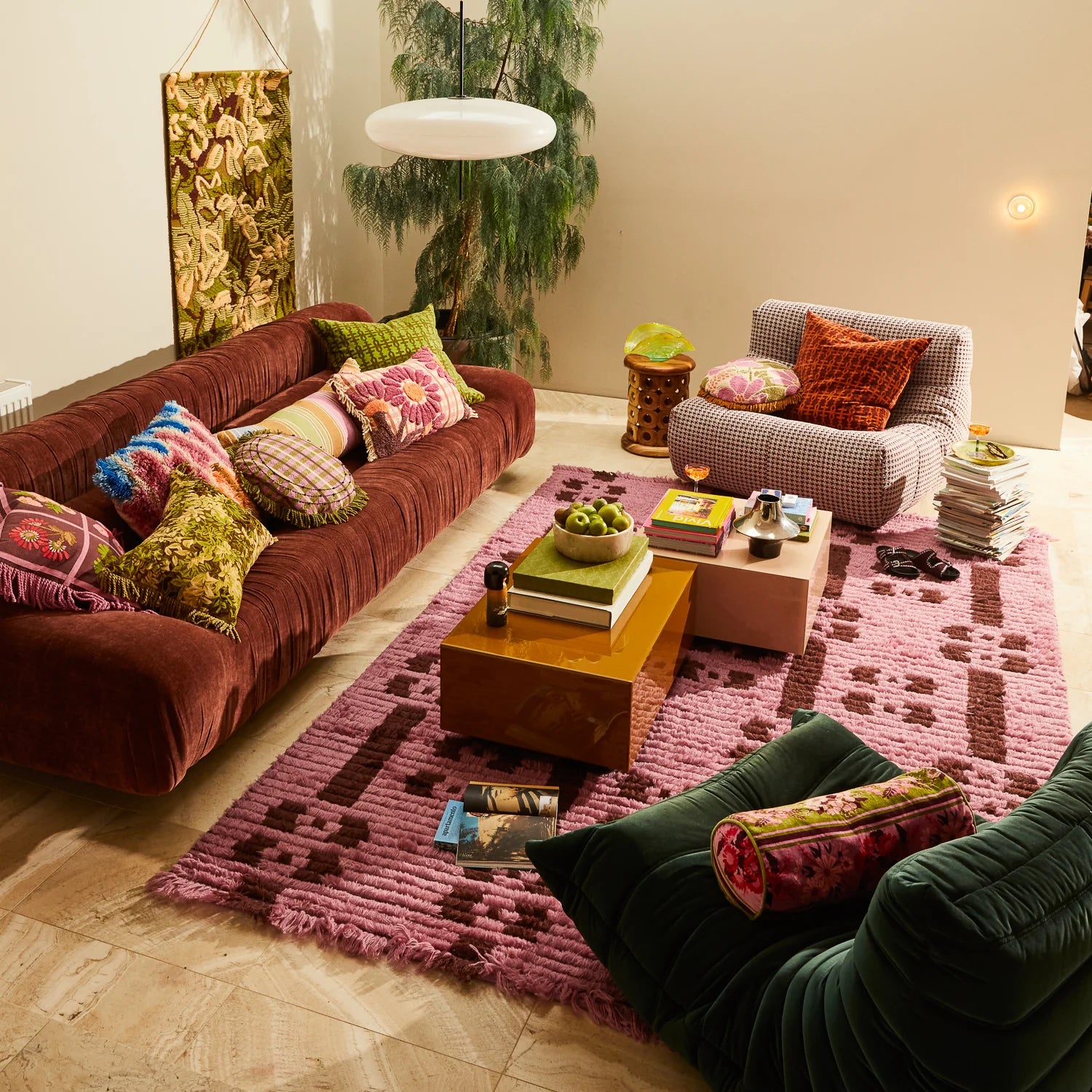 Mira Embroidered Cushion on display in lounge room setup