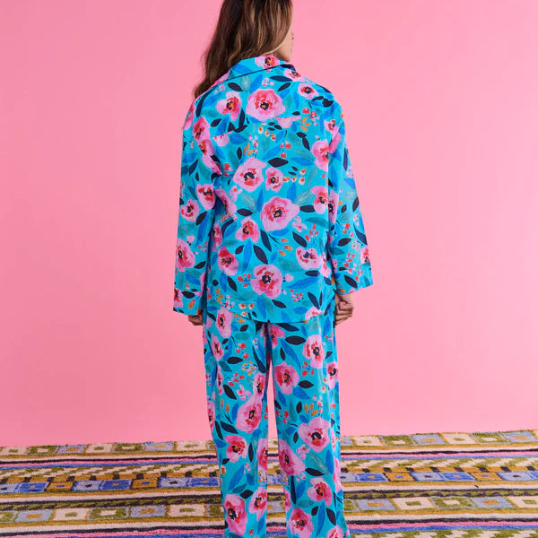 back view of model wearing Morning harvest organic cotton long sleeve shirt & pant pyjama set by Kip & Co