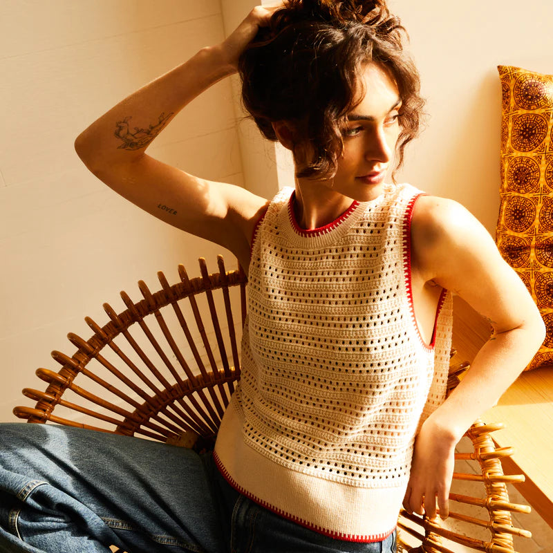 Cream knit singlet with red detailing made from organic cotton by Sage & Clare